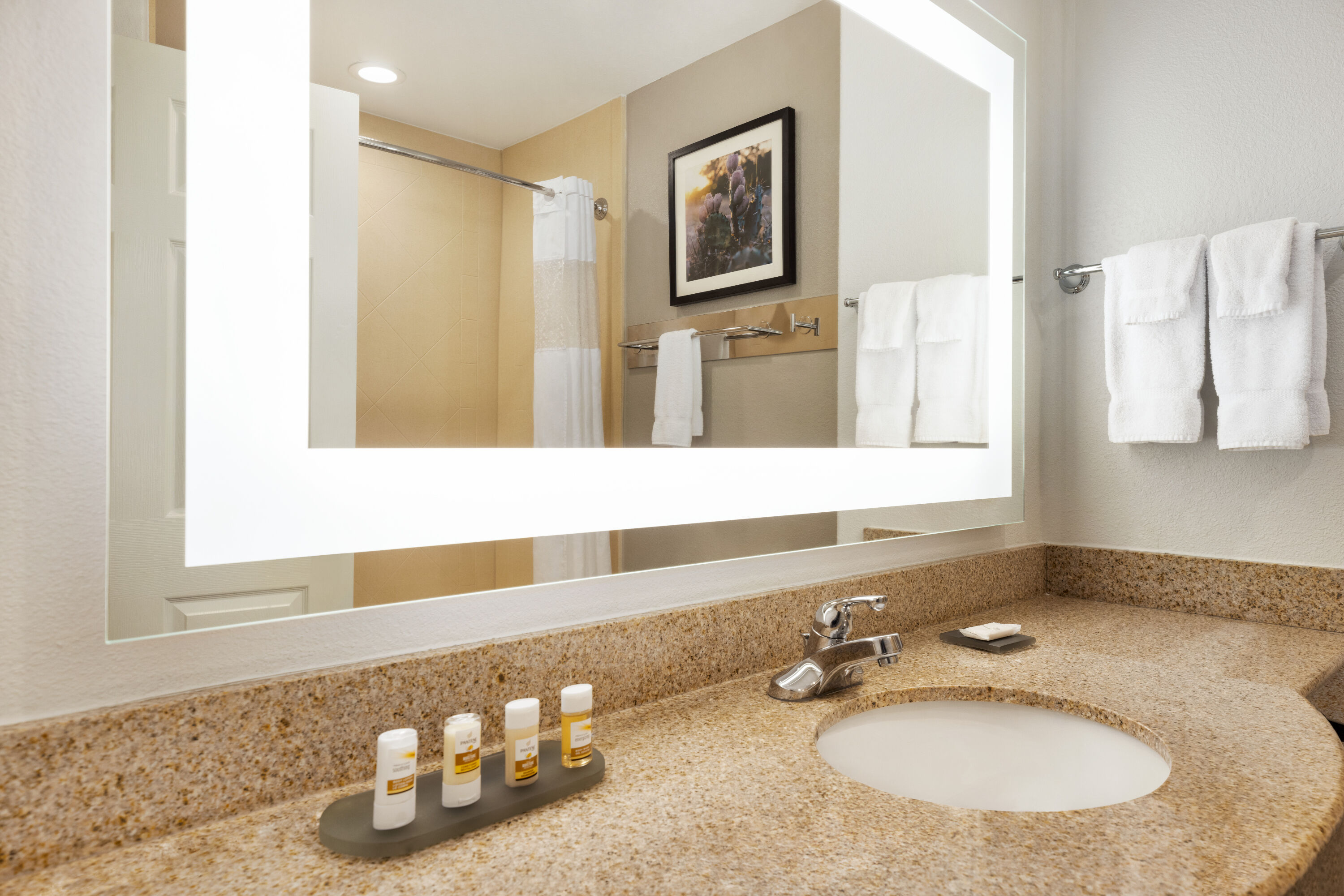 Guest room bath at the La Quinta Inn & Suites by Wyndham Port Arthur in Port Arthur, Texas