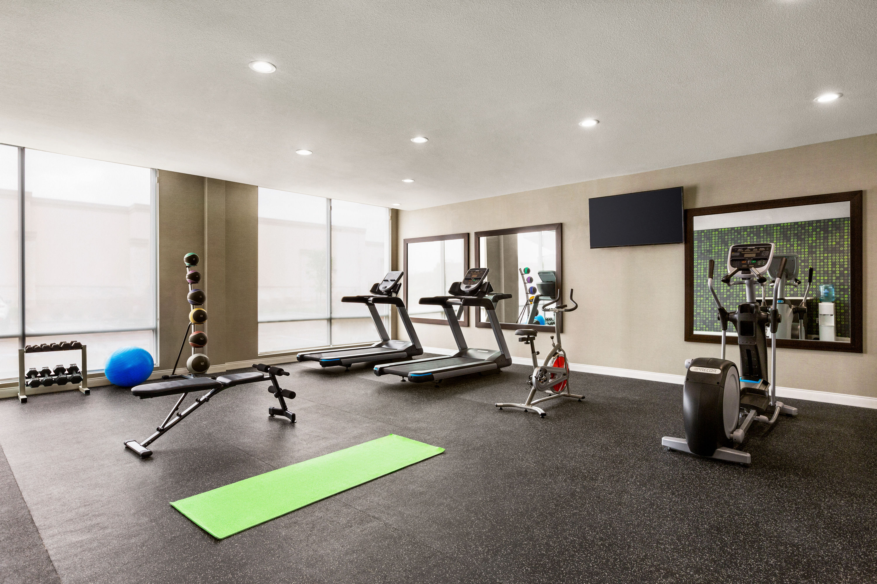 Fitness room at La Quinta Inn & Suites by Wyndham Richmond-Sugarland in Richmond, Texas
