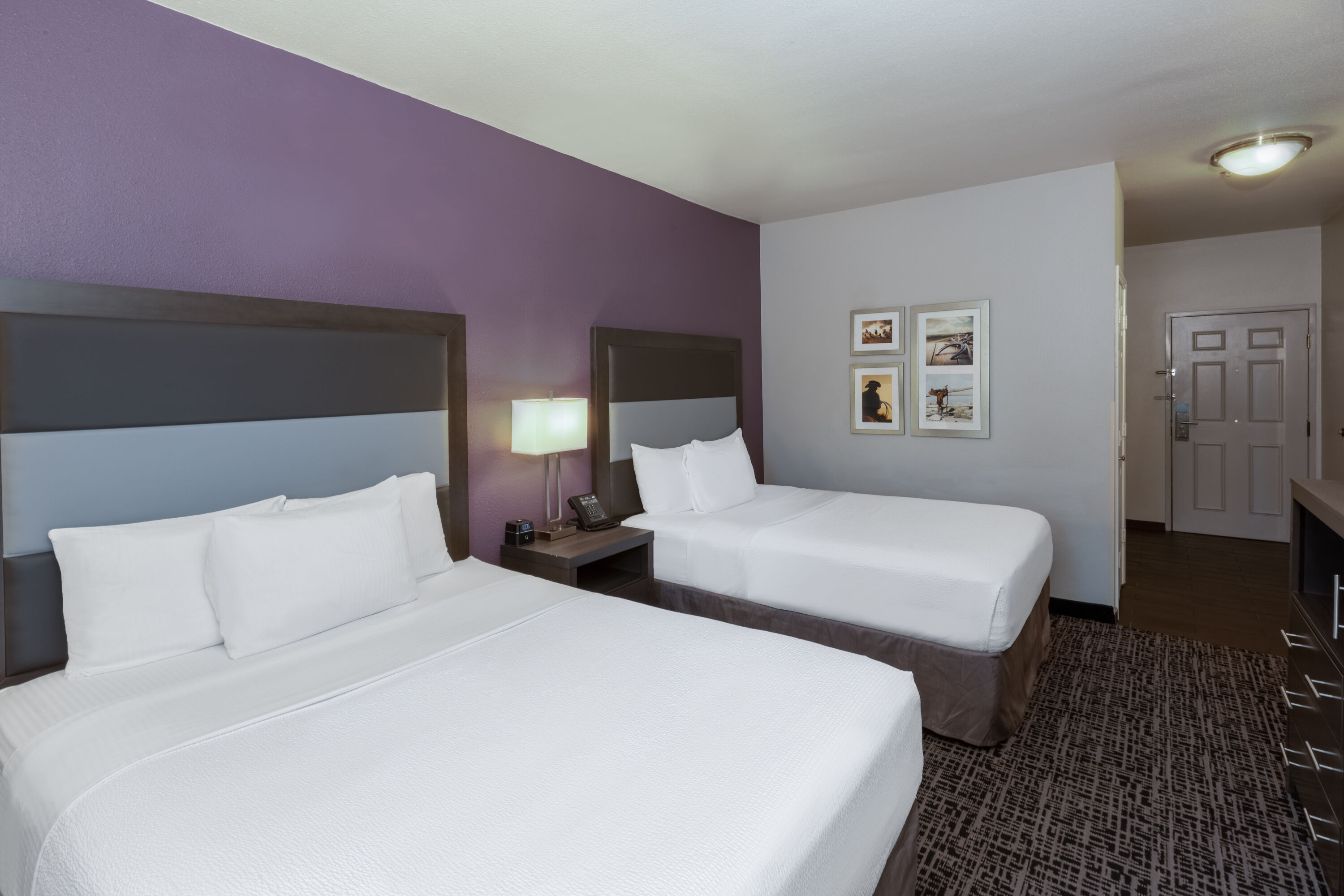 Guest room at the La Quinta Inn & Suites by Wyndham Rockwall in Rockwall, Texas