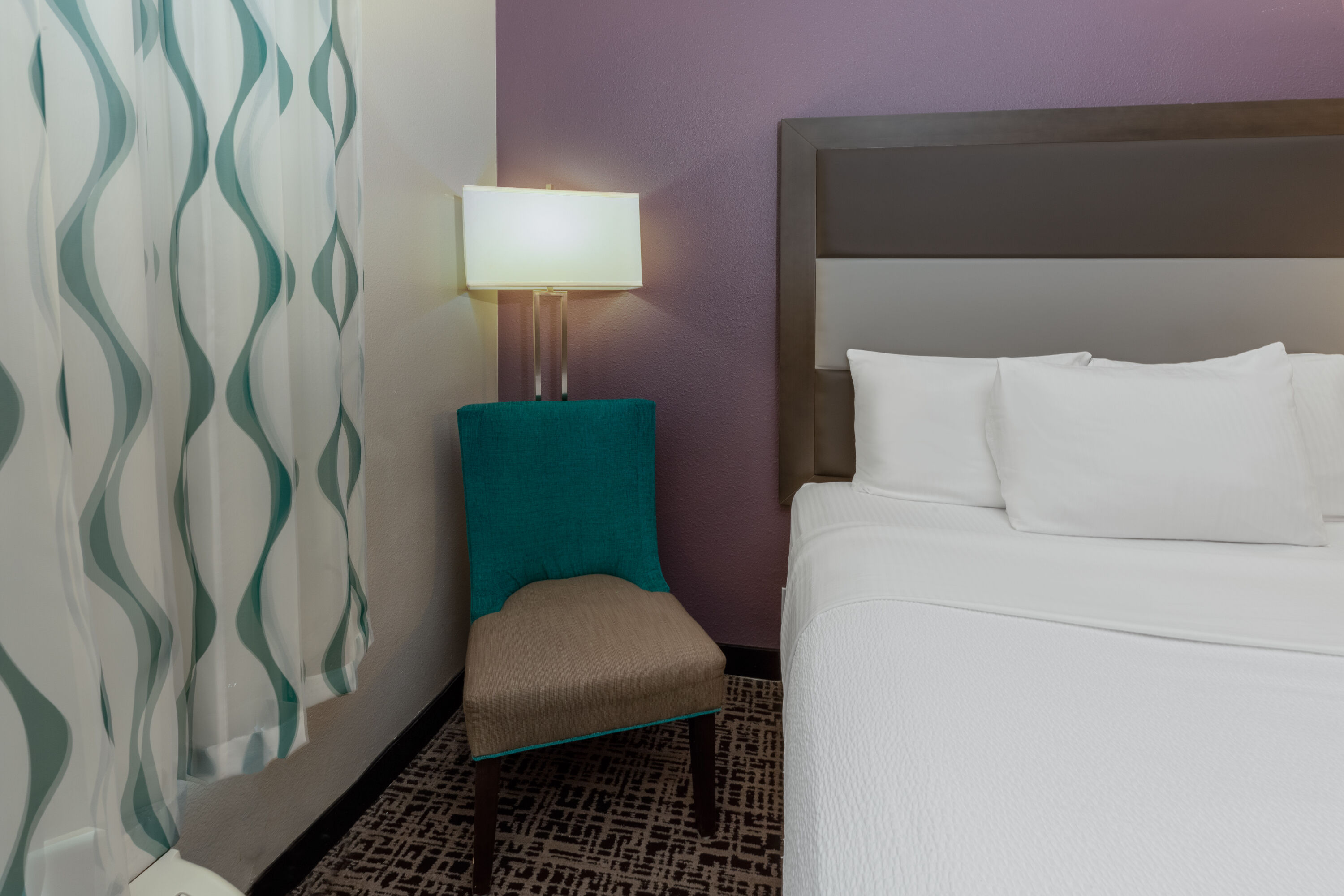 Guest room at the La Quinta Inn & Suites by Wyndham Rockwall in Rockwall, Texas