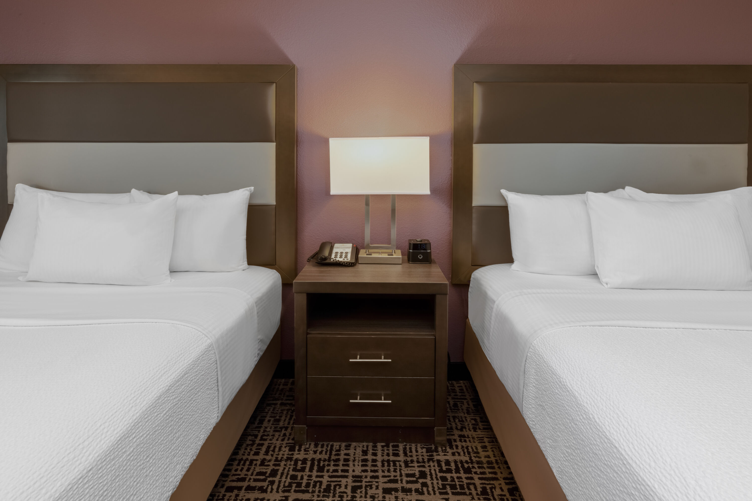 Double bed guest room at the La Quinta Inn & Suites by Wyndham Rockwall in Rockwall, Texas