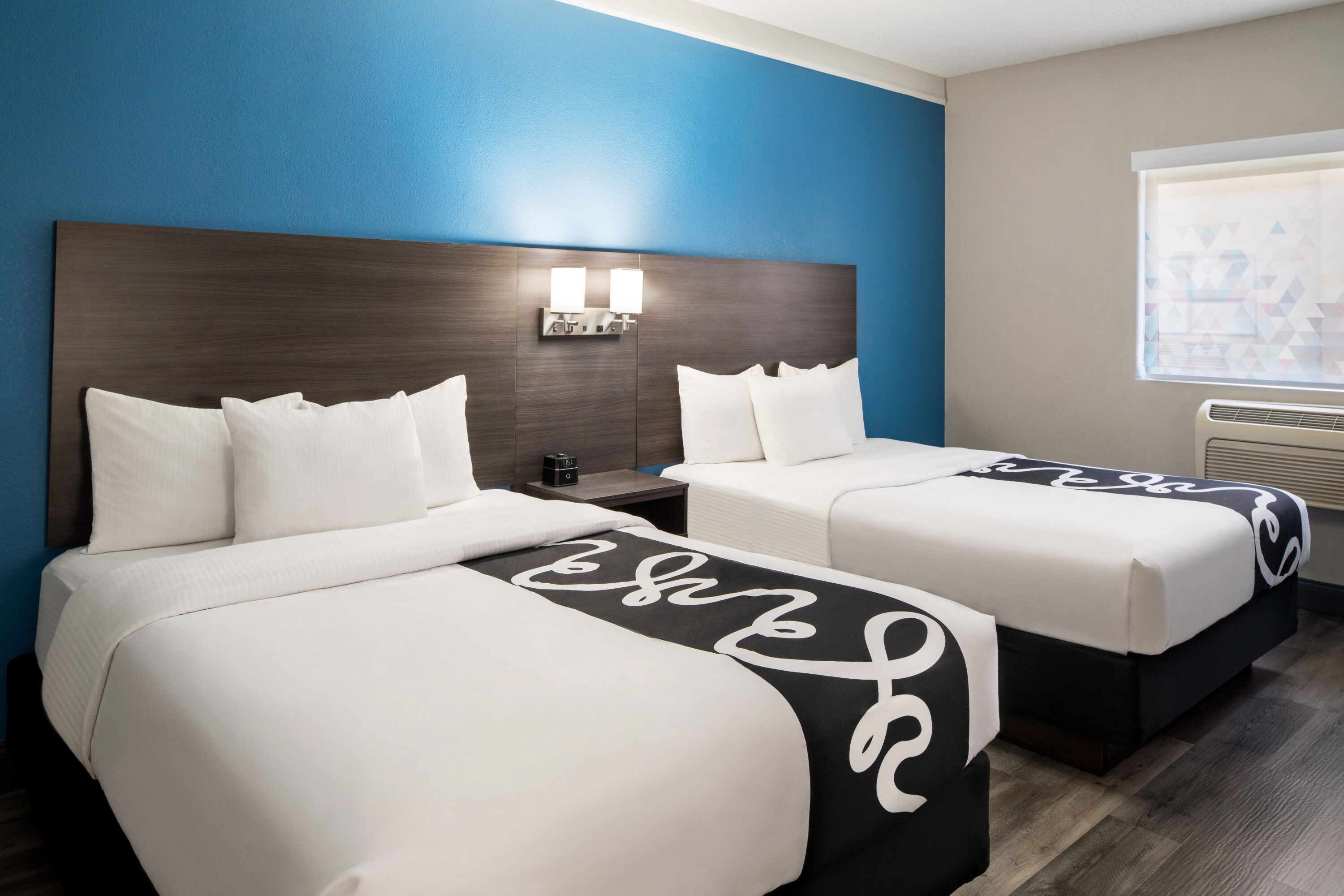 Guest room at the La Quinta Inn & Suites by Wyndham Round Rock North in Round Rock, Texas