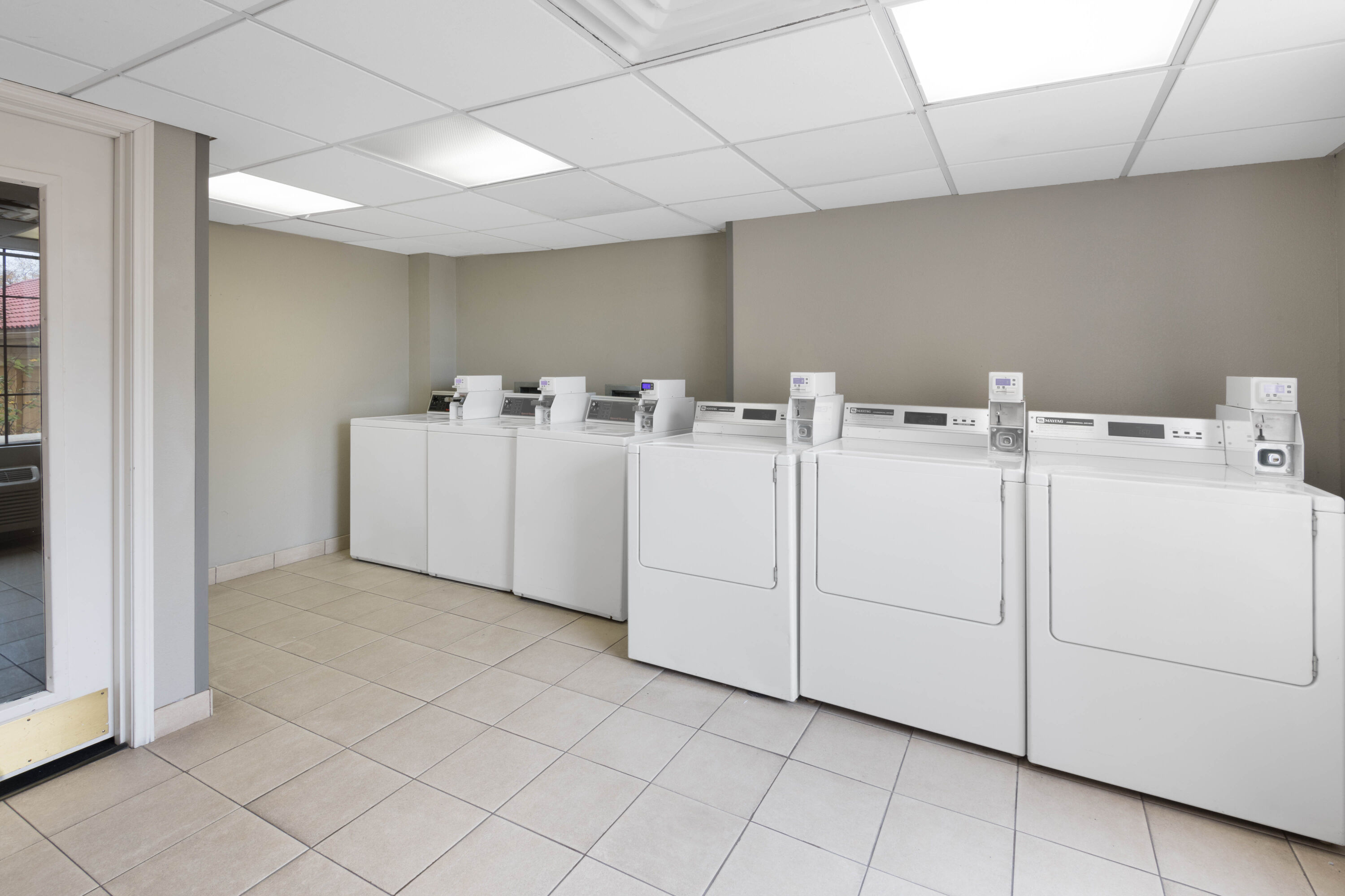 Laundry facilities at La Quinta Inn & Suites by Wyndham San Antonio Riverwalk in San Antonio, Texas