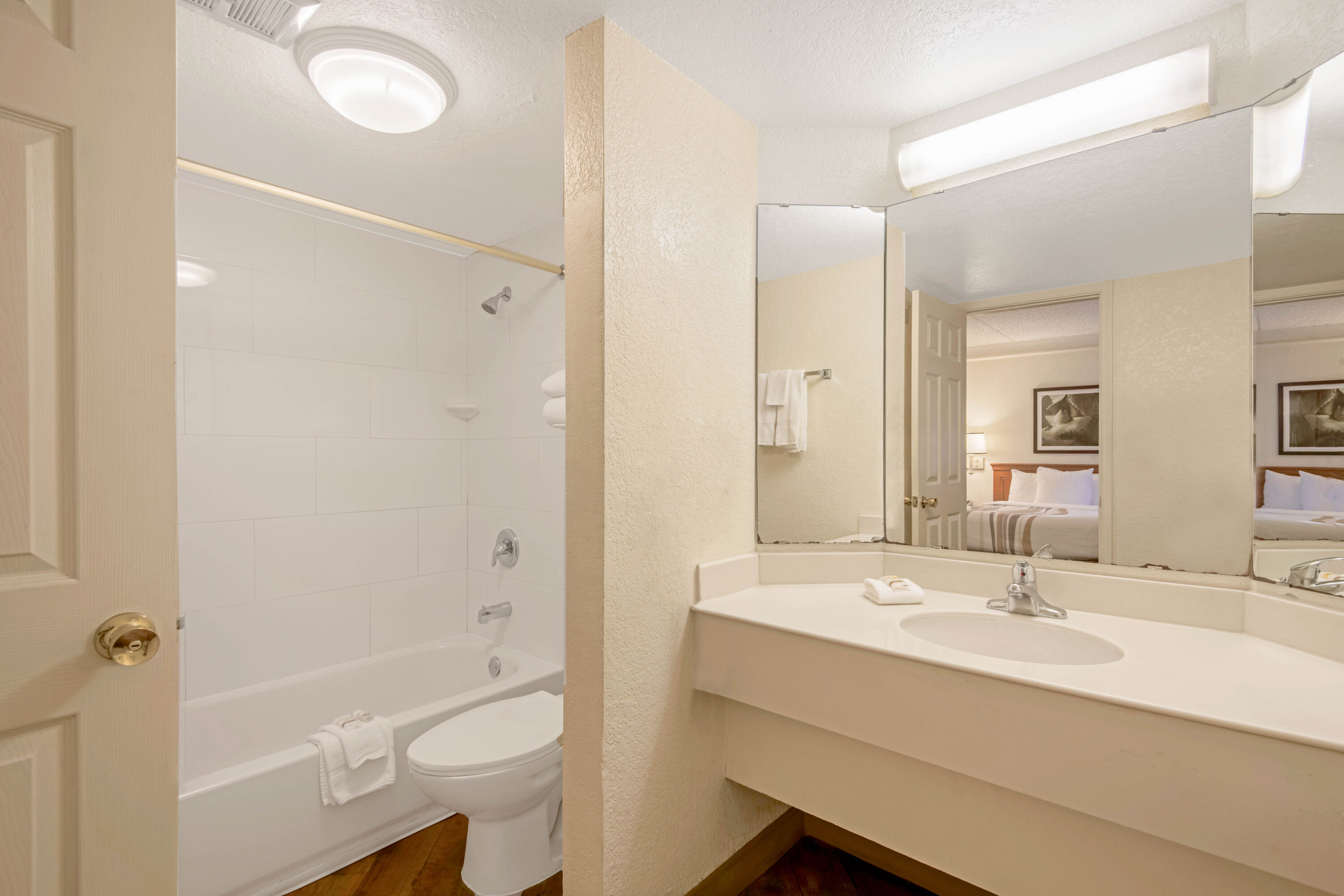 Guest room bath at the La Quinta Inn by Wyndham San Antonio Market Square in San Antonio, Texas