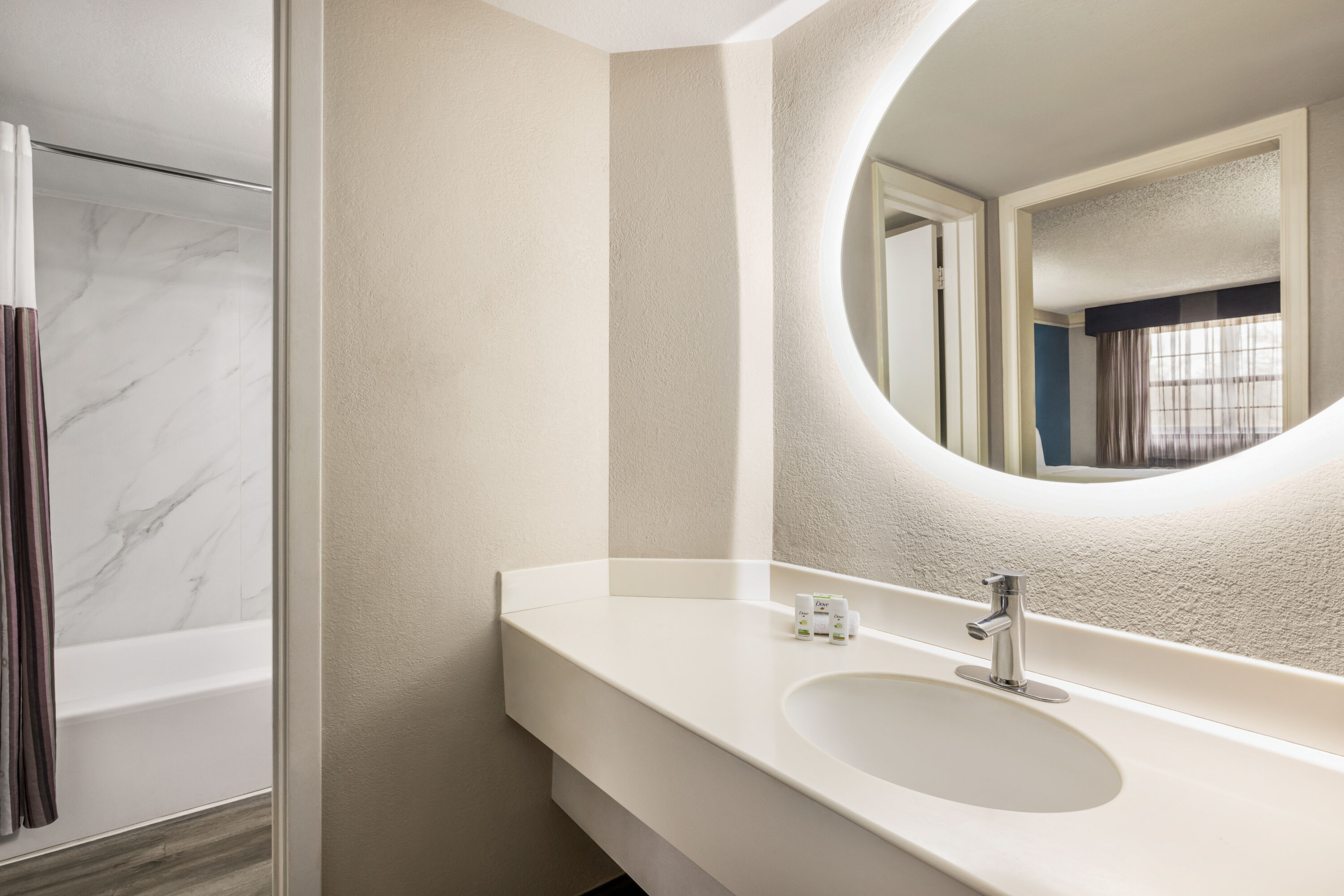Guest room bath at the La Quinta Inn by Wyndham San Antonio I-35 N at Toepperwein in San Antonio, Texas