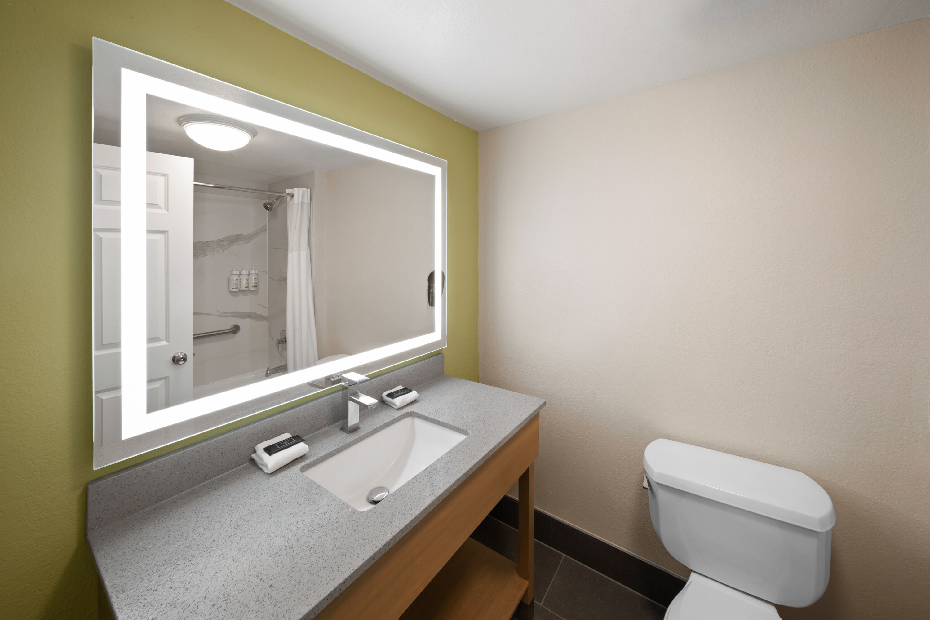 Guest room bath at the La Quinta Inn & Suites by Wyndham San Antonio Airport in San Antonio, Texas