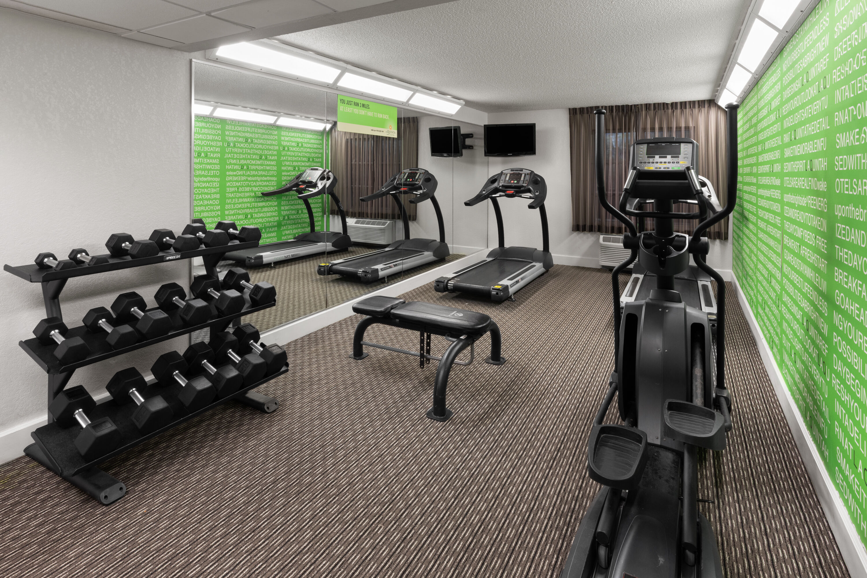Fitness room at La Quinta Inn & Suites by Wyndham San Antonio Airport in San Antonio, Texas