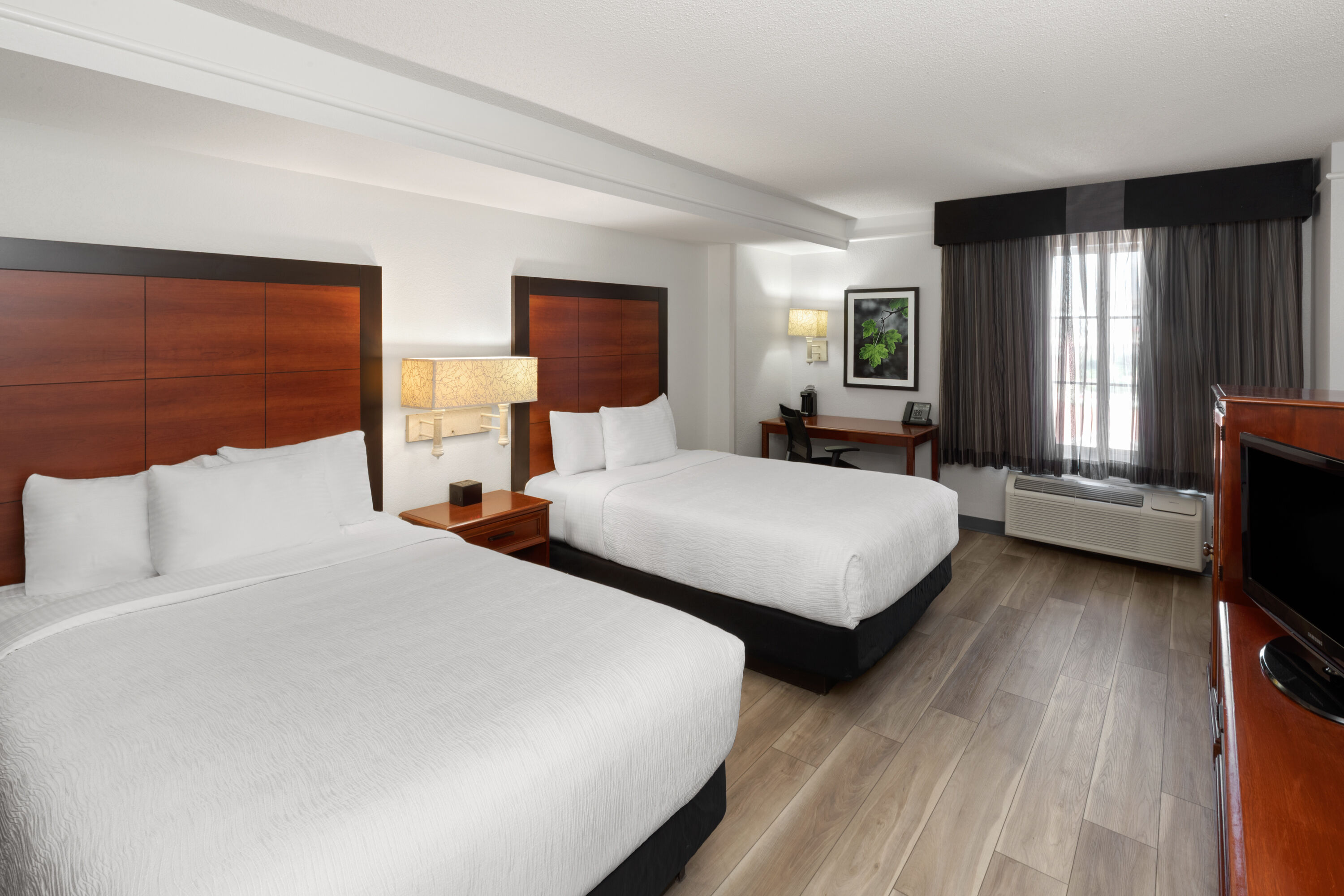 Guest room at the La Quinta Inn & Suites by Wyndham San Antonio Airport in San Antonio, Texas