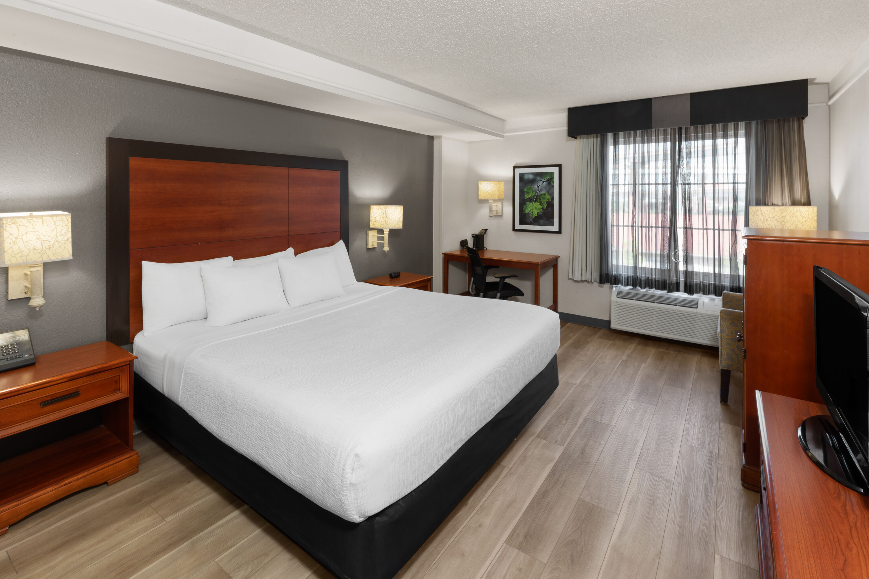 Guest room at the La Quinta Inn & Suites by Wyndham San Antonio Airport in San Antonio, Texas