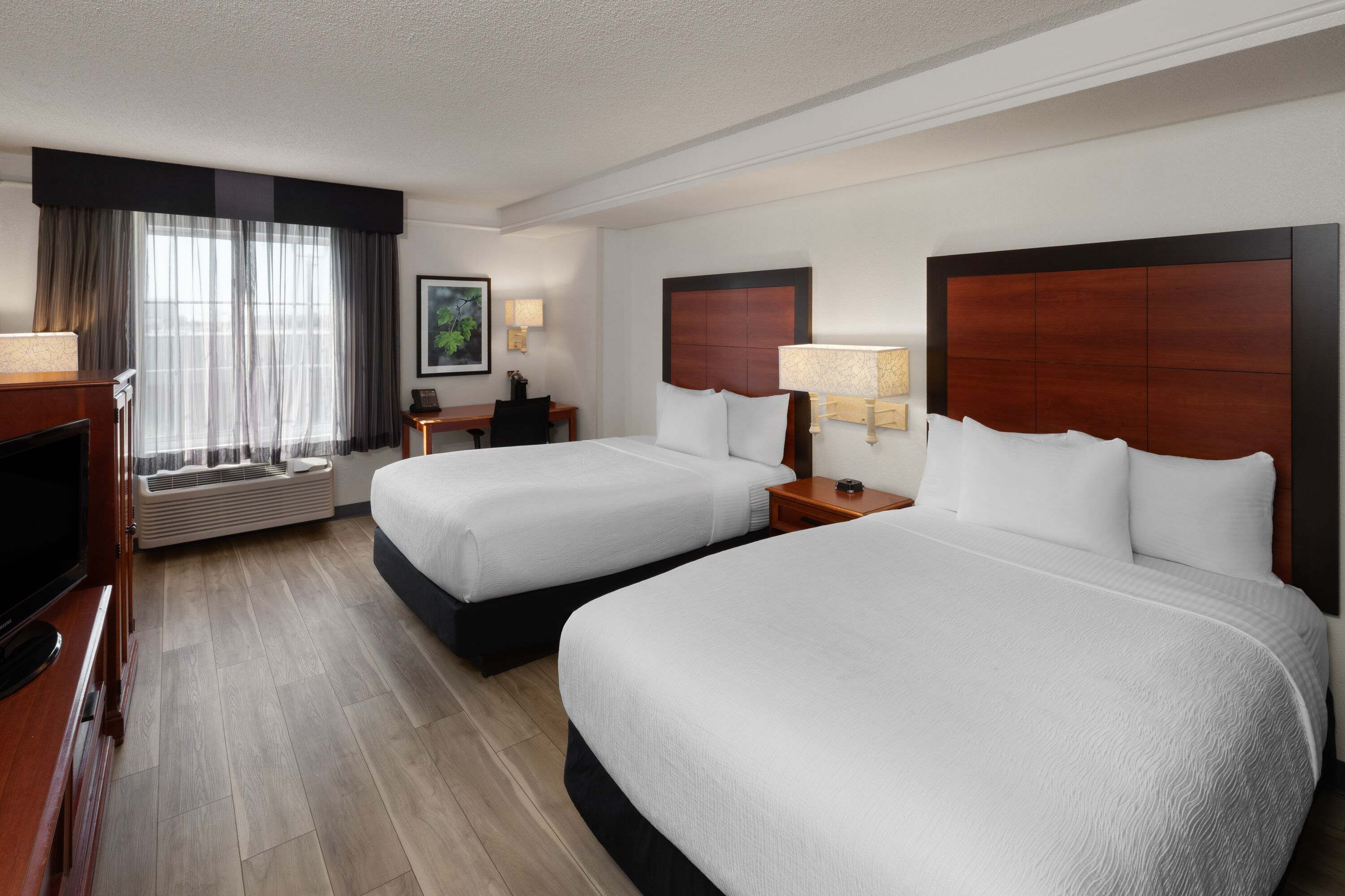 Guest room at the La Quinta Inn & Suites by Wyndham San Antonio Airport in San Antonio, Texas