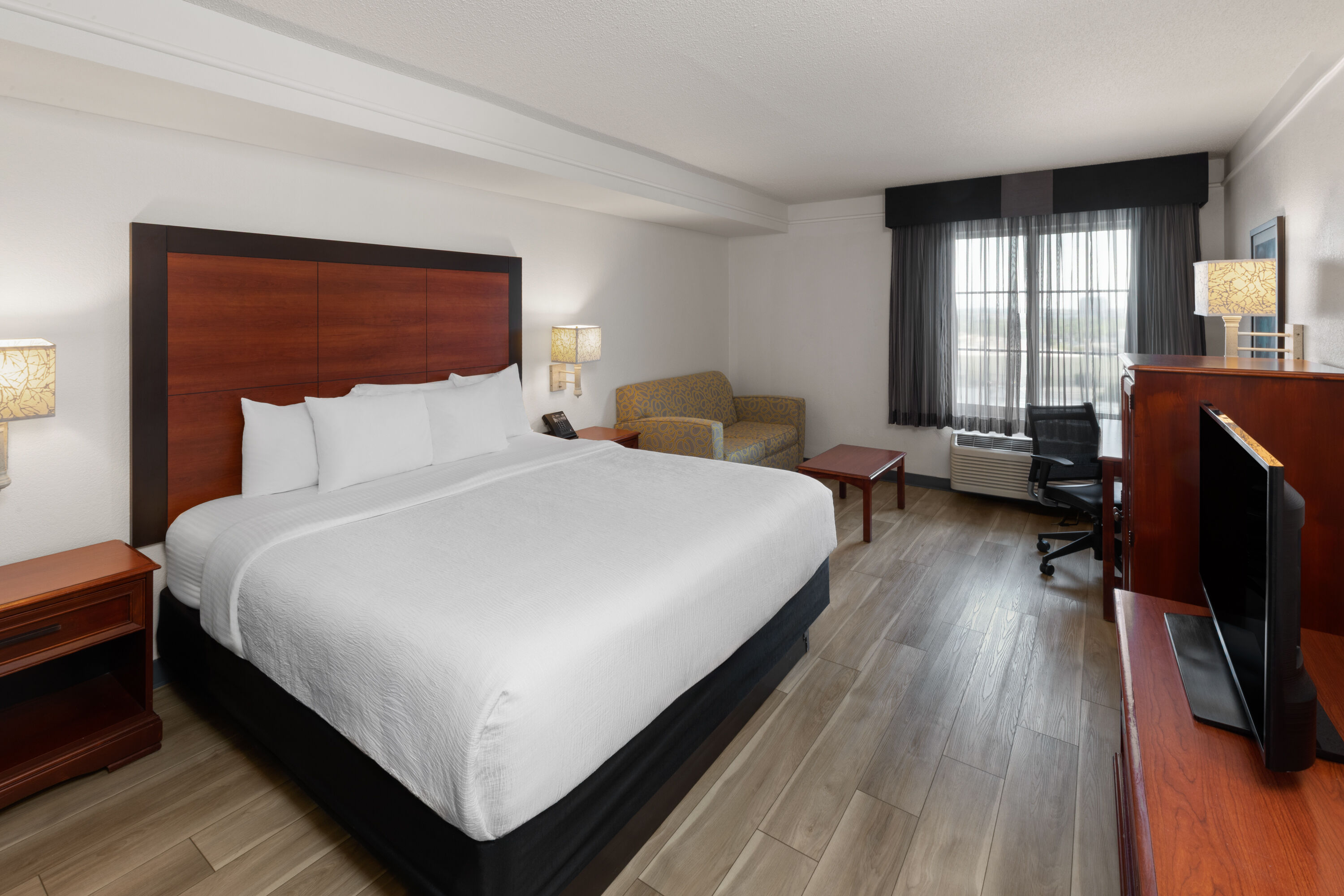 Guest room at the La Quinta Inn & Suites by Wyndham San Antonio Airport in San Antonio, Texas