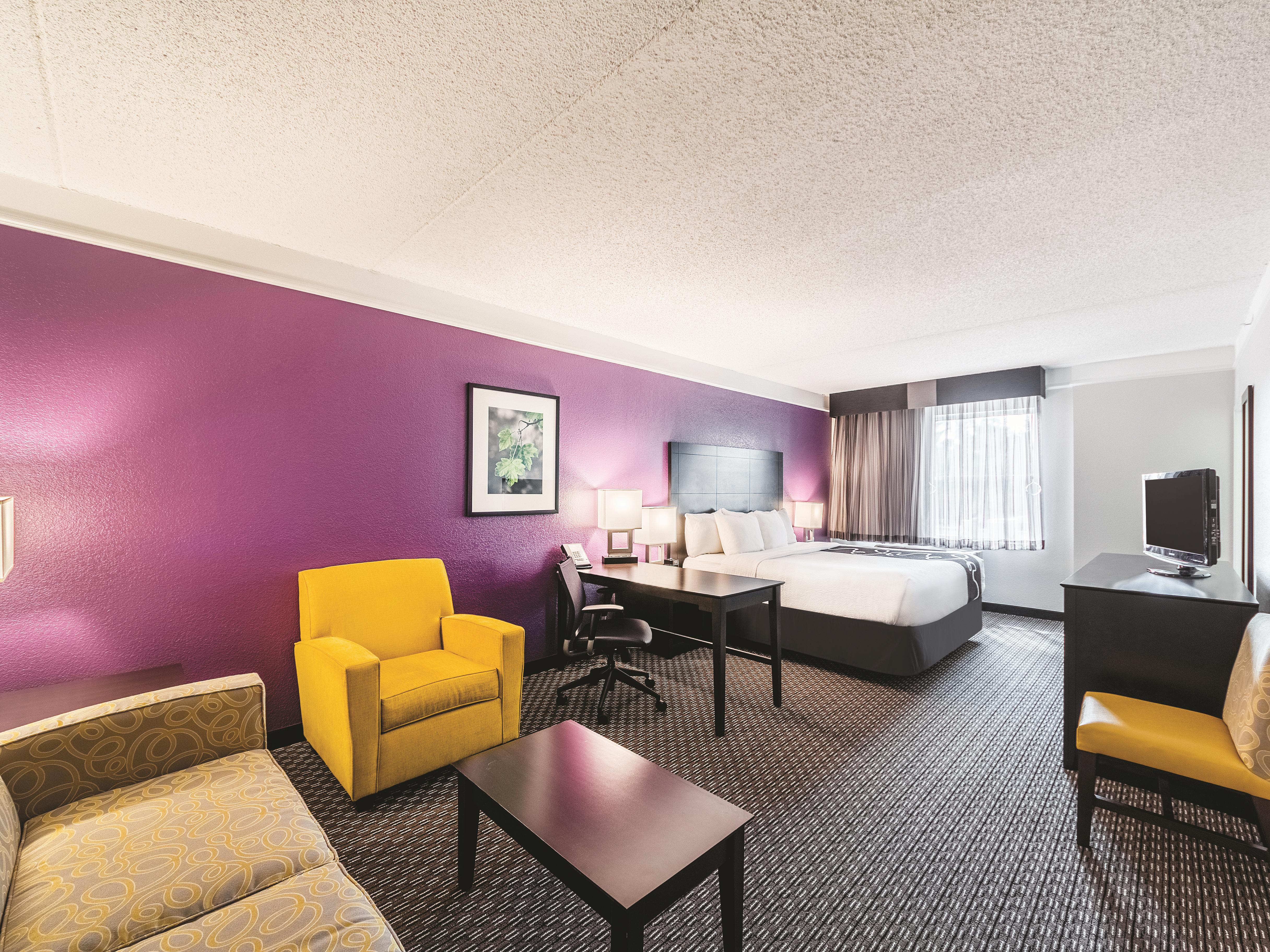 Guest room at the La Quinta Inn & Suites by Wyndham San Antonio Downtown in San Antonio, Texas