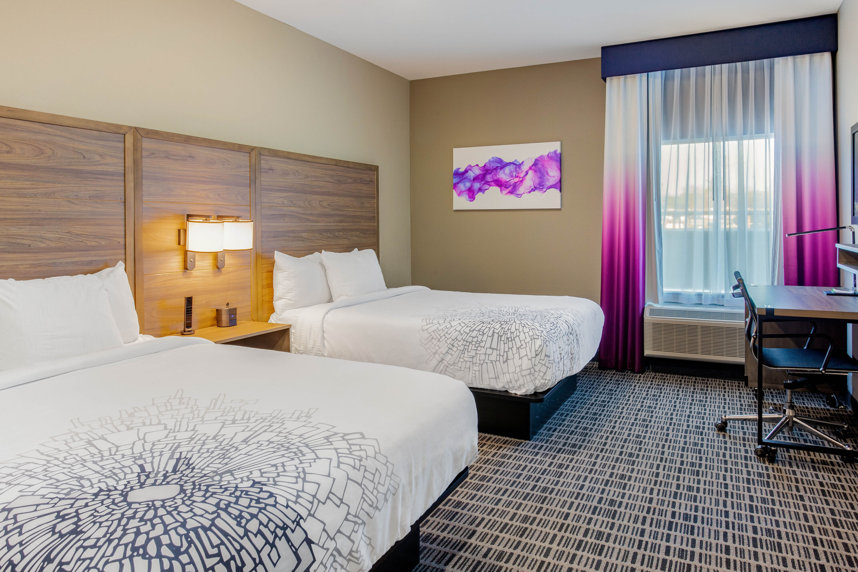 Guest room at the La Quinta Inn & Suites by Wyndham San Antonio Alamo City in San Antonio, Texas