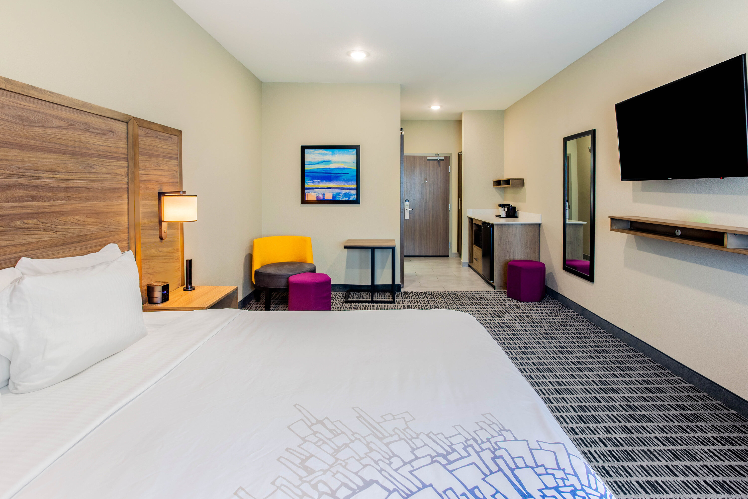 Guest room at the La Quinta Inn & Suites by Wyndham San Antonio Alamo City in San Antonio, Texas