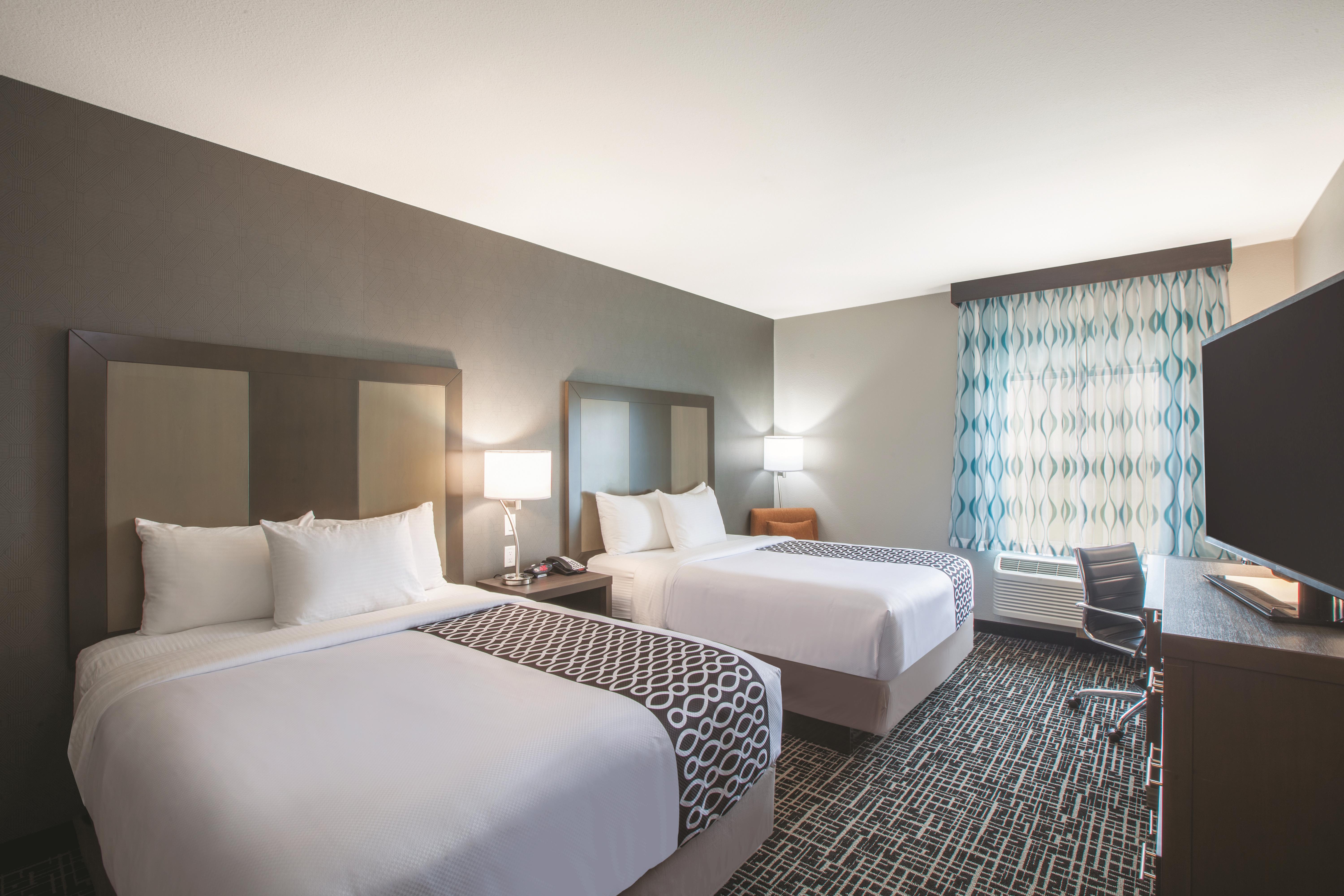 Guest room at the La Quinta Inn & Suites by Wyndham San Marcos Outlet Mall in San Marcos, Texas