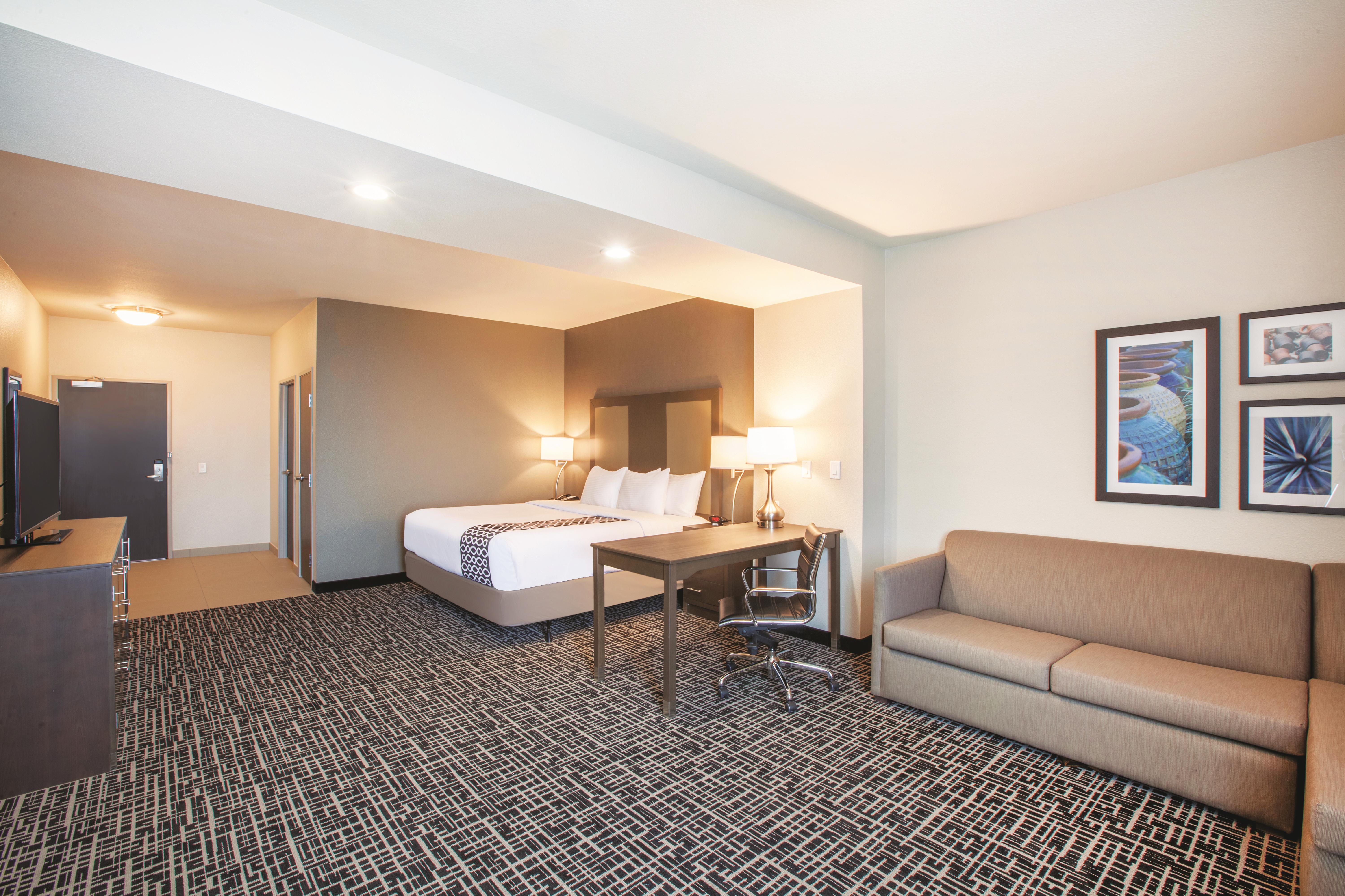 Guest room at the La Quinta Inn & Suites by Wyndham San Marcos Outlet Mall in San Marcos, Texas