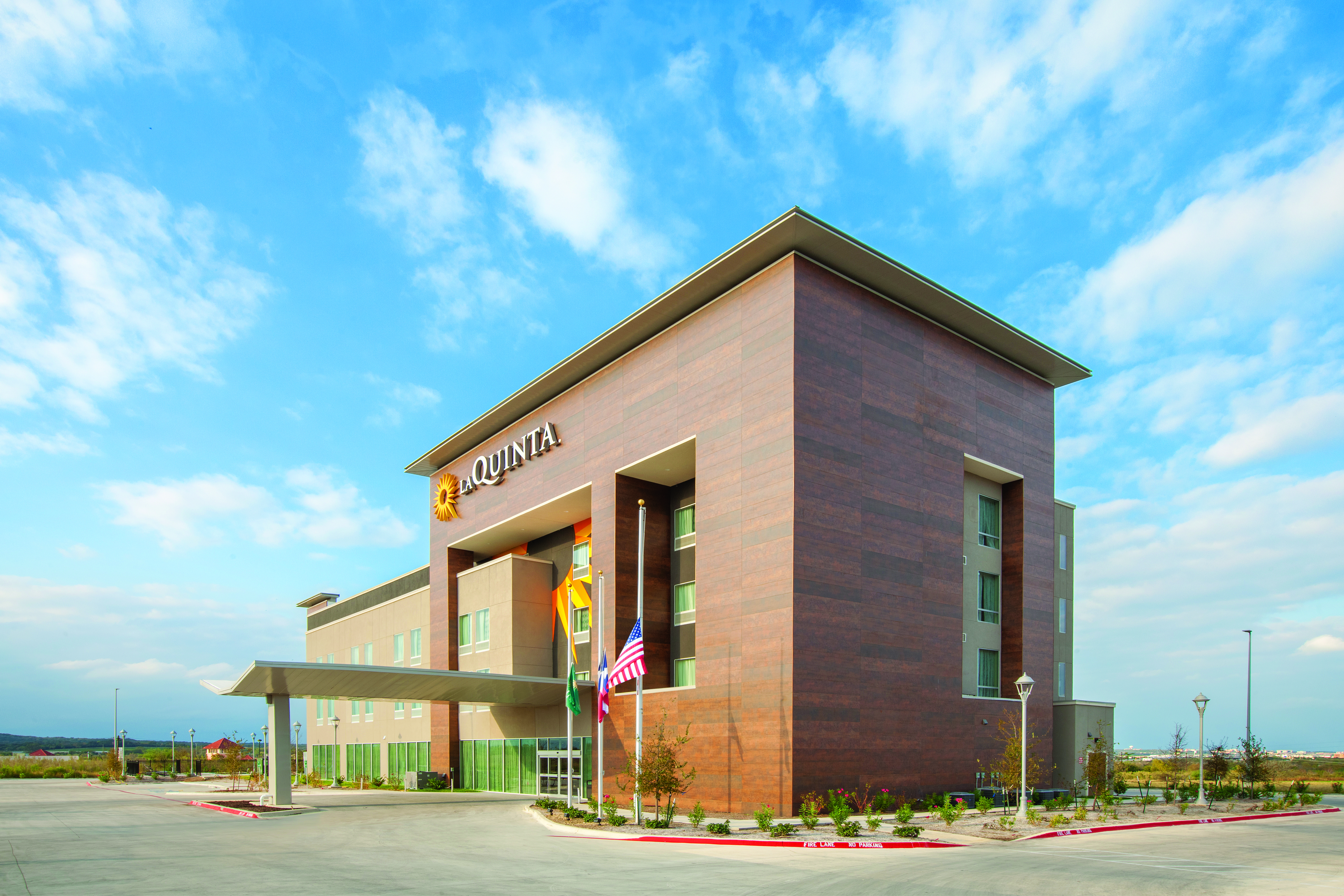 Exterior of La Quinta Inn & Suites by Wyndham San Marcos Outlet Mall hotel in San Marcos, Texas