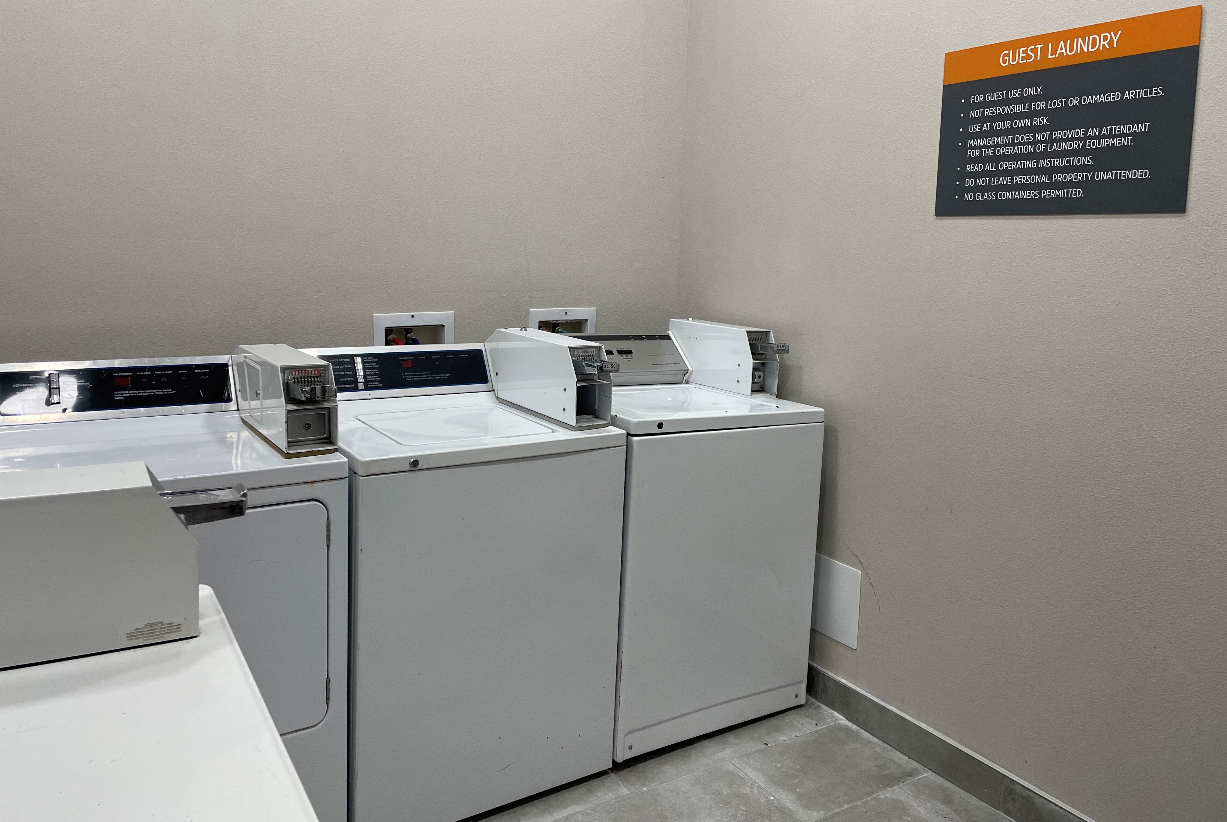 Laundry facilities at La Quinta Inn & Suites by Wyndham Schertz in Schertz, Texas