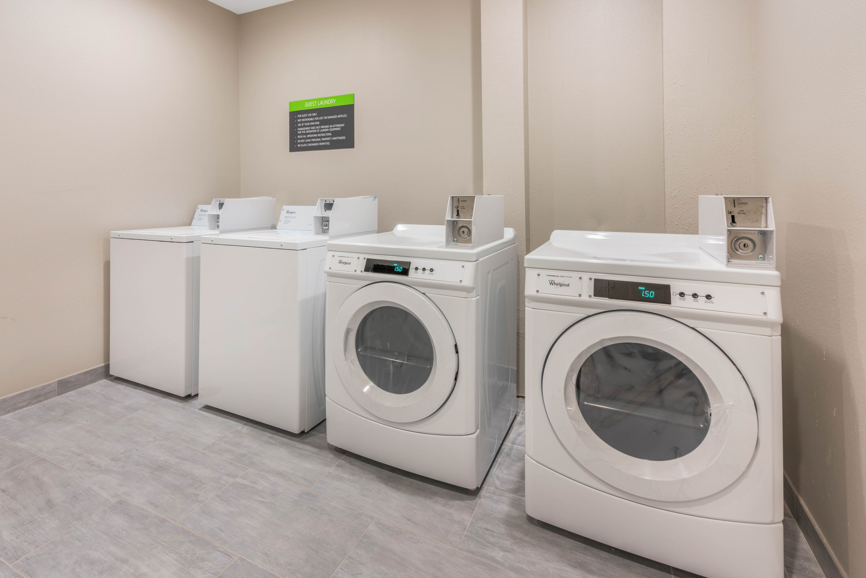 Laundry facilities at La Quinta Inn & Suites by Wyndham Houston Spring South in Spring, Texas