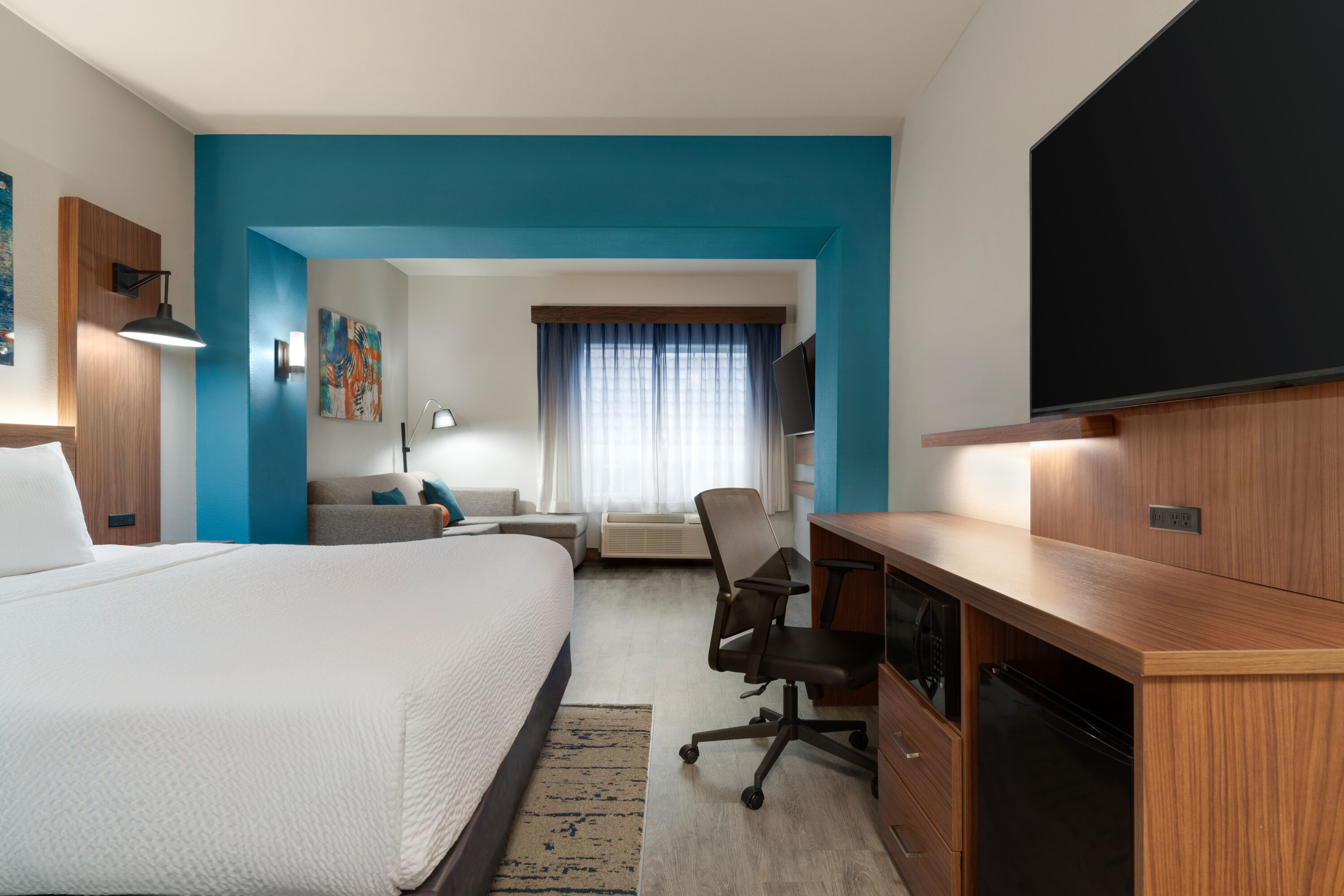 Guest room at the La Quinta Inn & Suites by Wyndham Stephenville in Stephenville, Texas