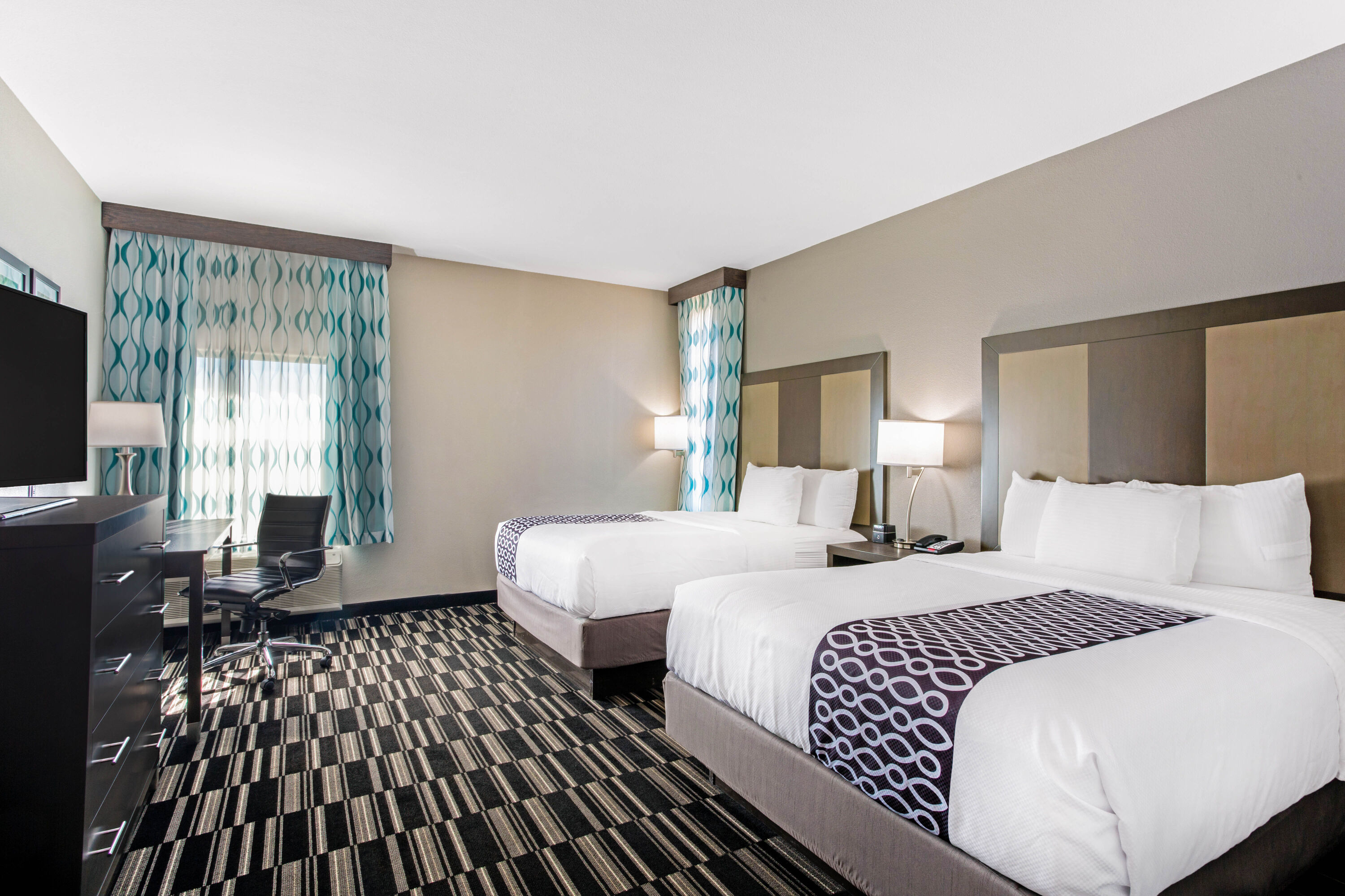 Guest room at the La Quinta Inn & Suites by Wyndham Sweetwater East in Sweetwater, Texas