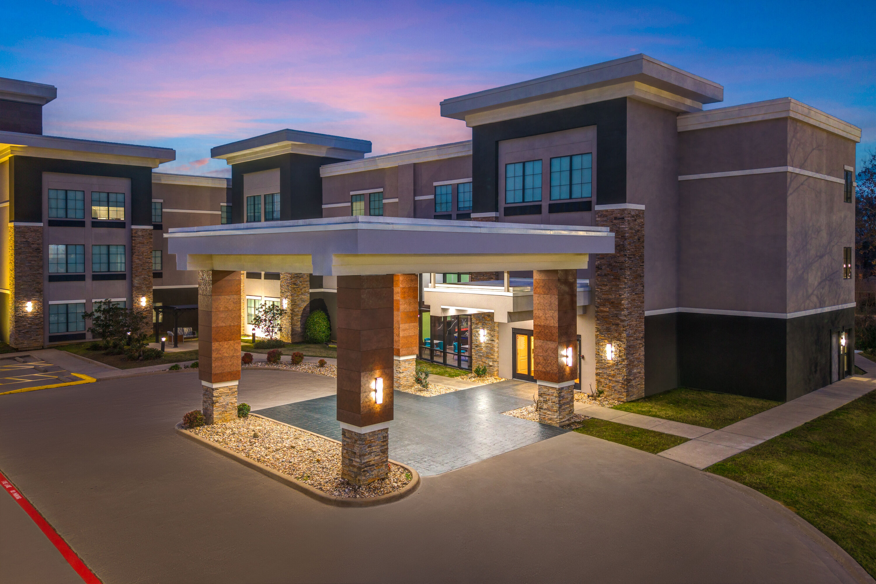 Exterior Dusk Image of La Quinta Inn & Suites by Wyndham Tyler - University Area hotel in Tyler, Texas