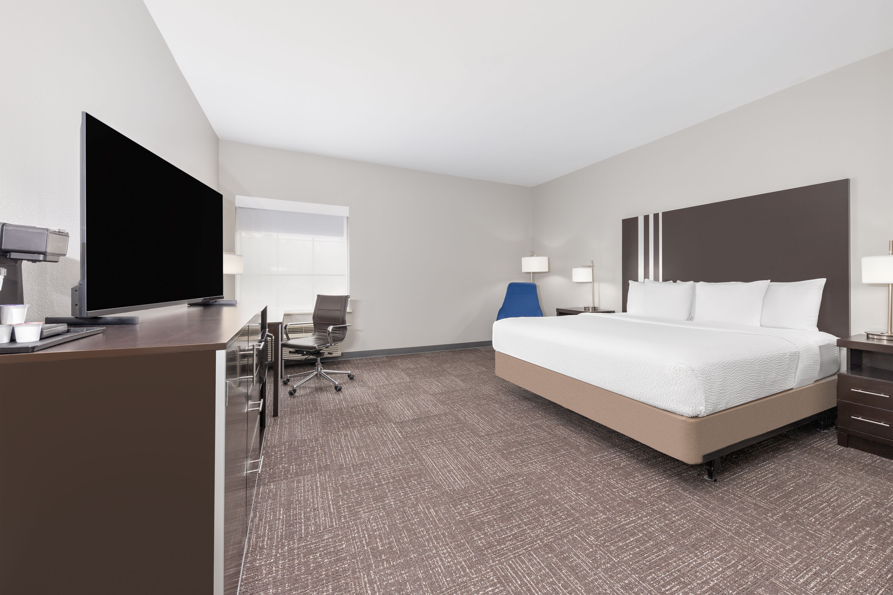 Guest room at the La Quinta Inn & Suites by Wyndham Tyler - University Area in Tyler, Texas