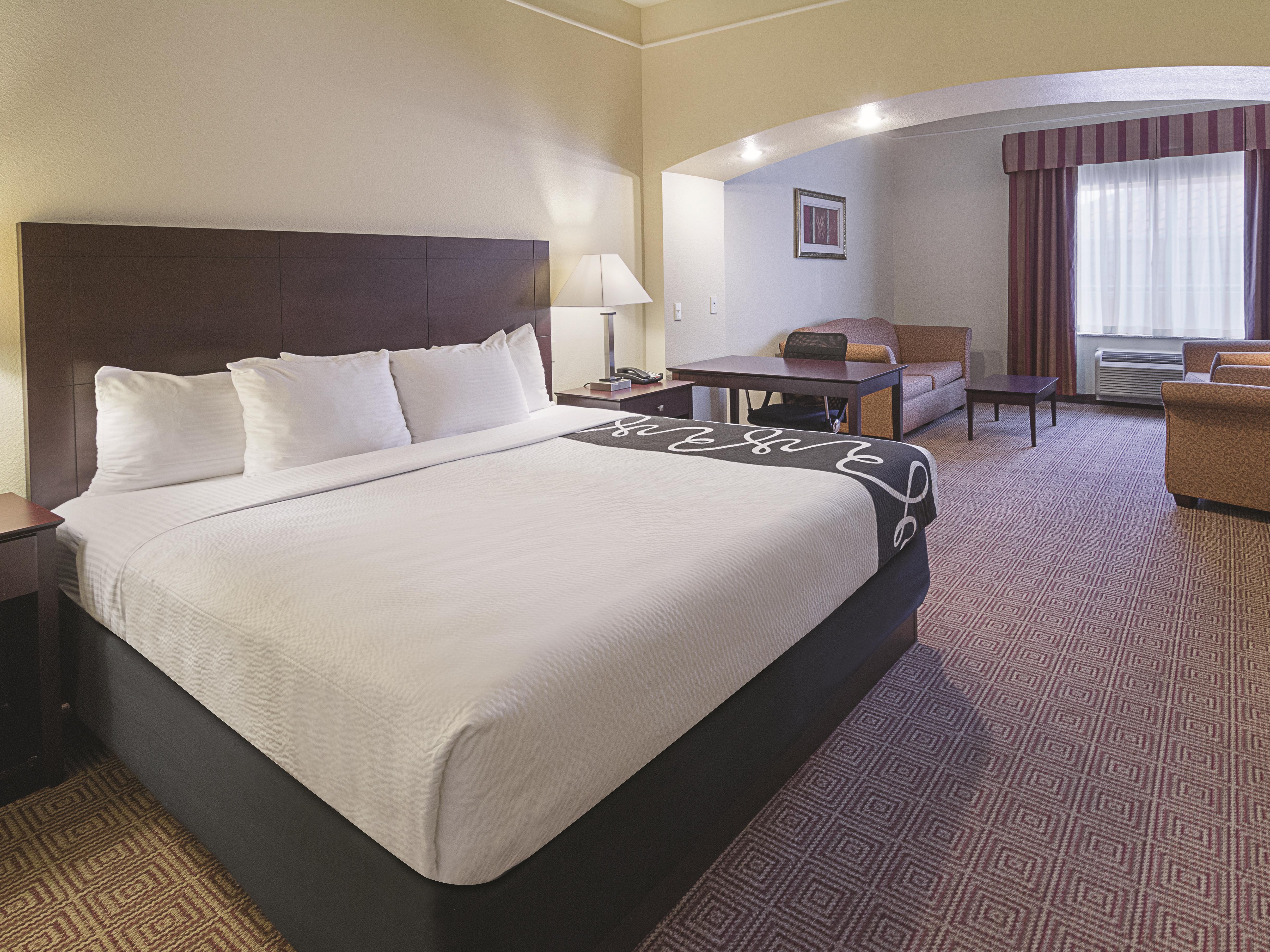 Guest room at the La Quinta Inn & Suites by Wyndham Waxahachie in Waxahachie, Texas