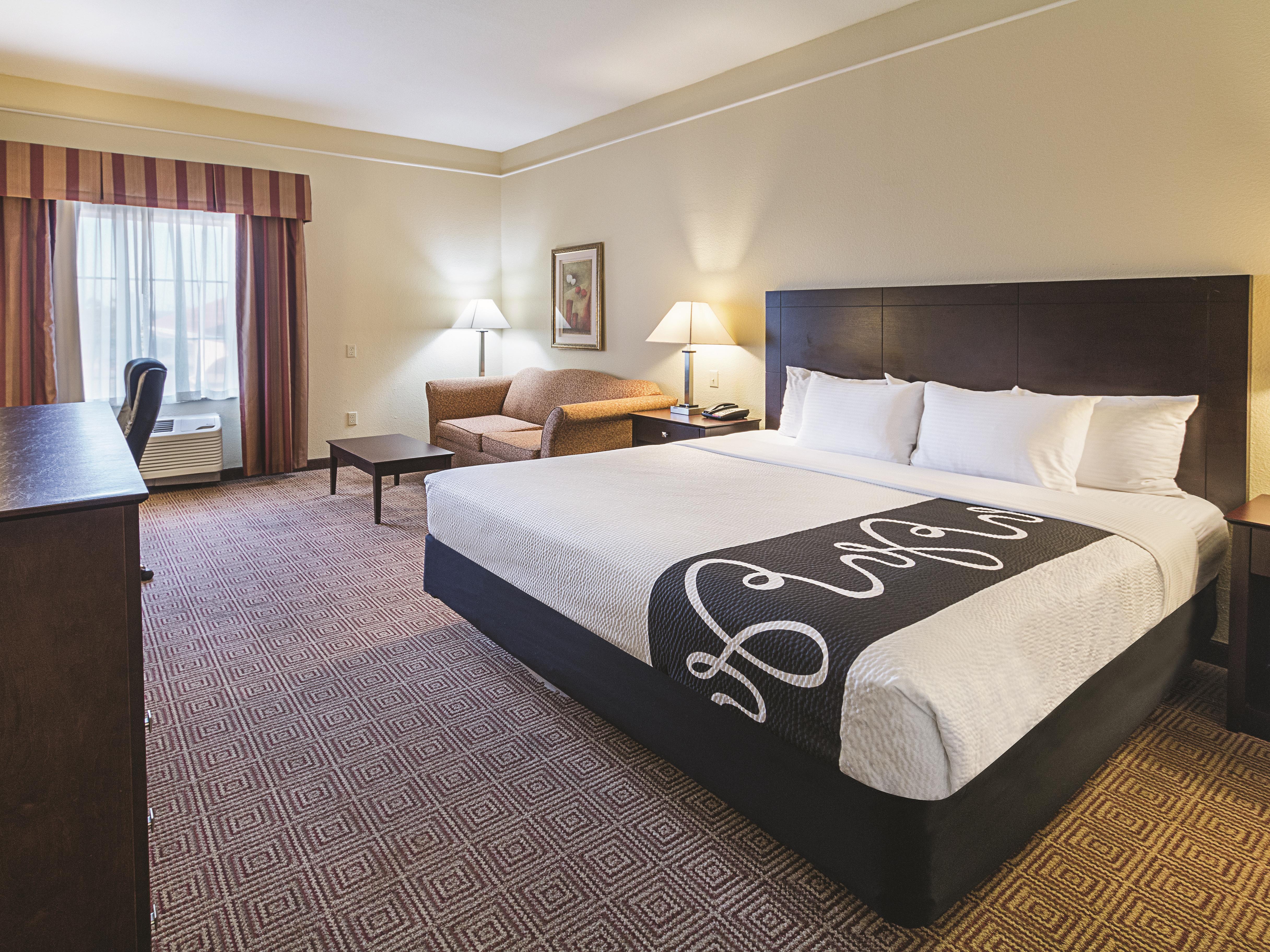 Guest room at the La Quinta Inn & Suites by Wyndham Waxahachie in Waxahachie, Texas
