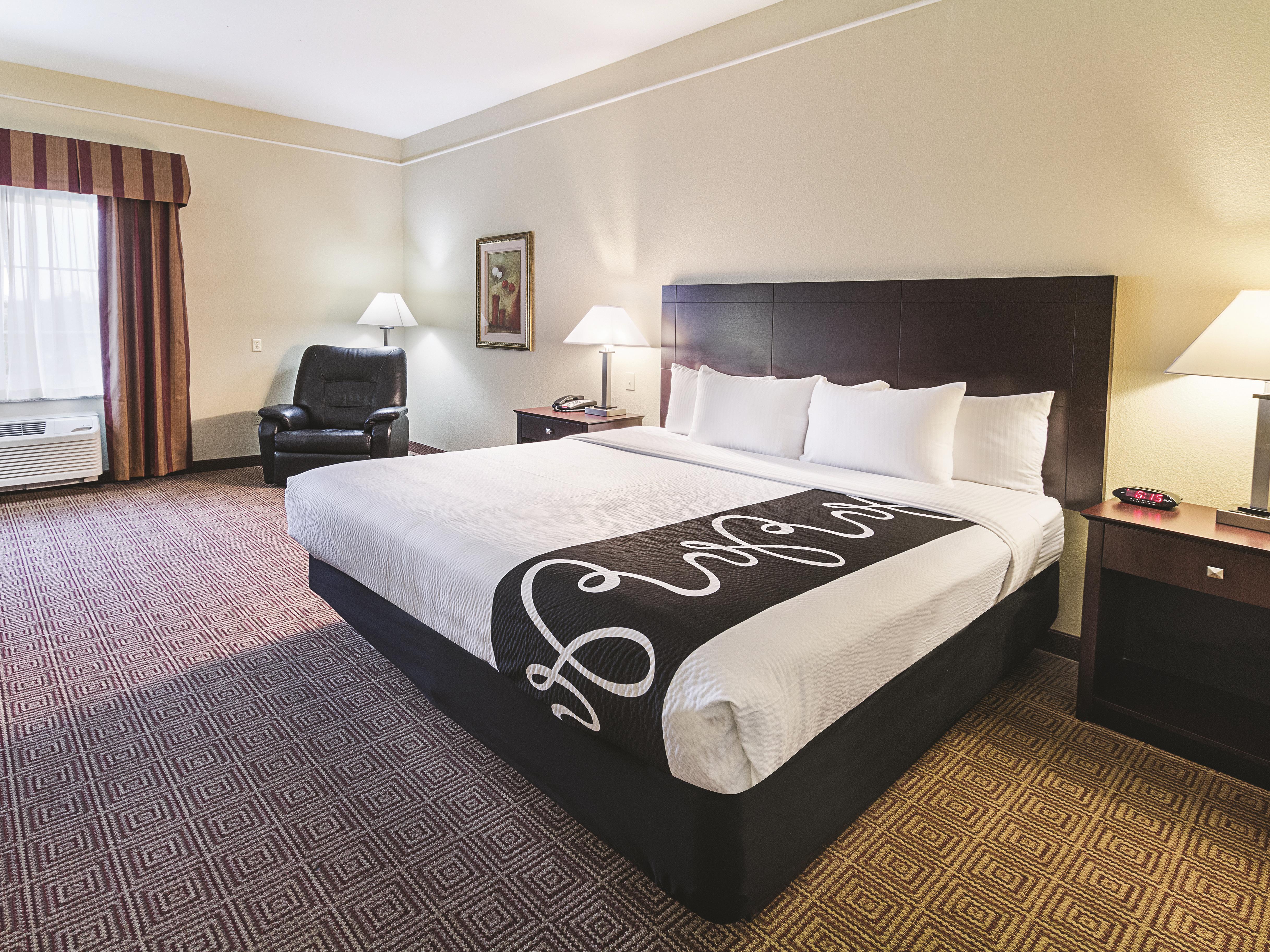 Guest room at the La Quinta Inn & Suites by Wyndham Waxahachie in Waxahachie, Texas