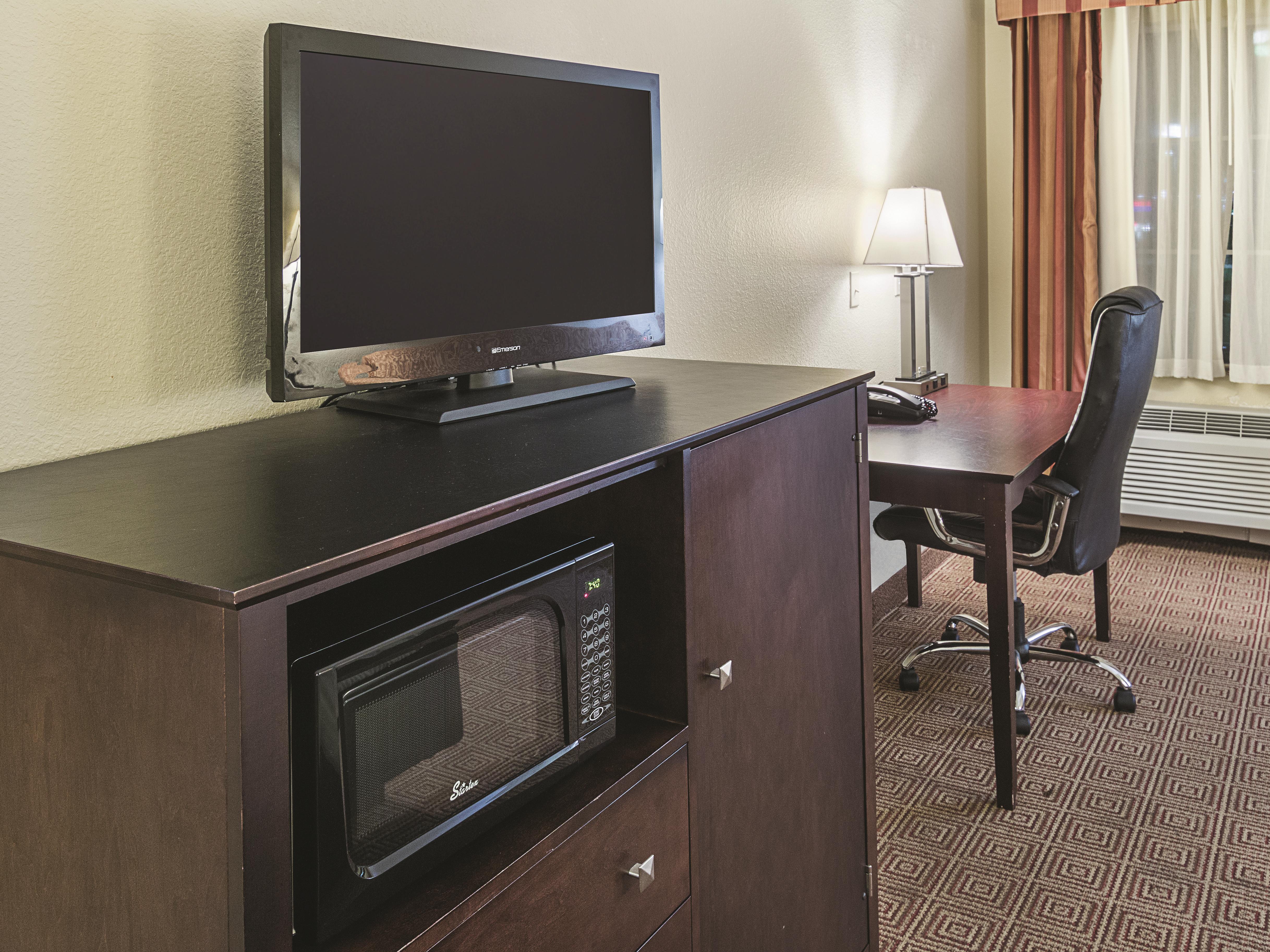 Guest room at the La Quinta Inn & Suites by Wyndham Waxahachie in Waxahachie, Texas