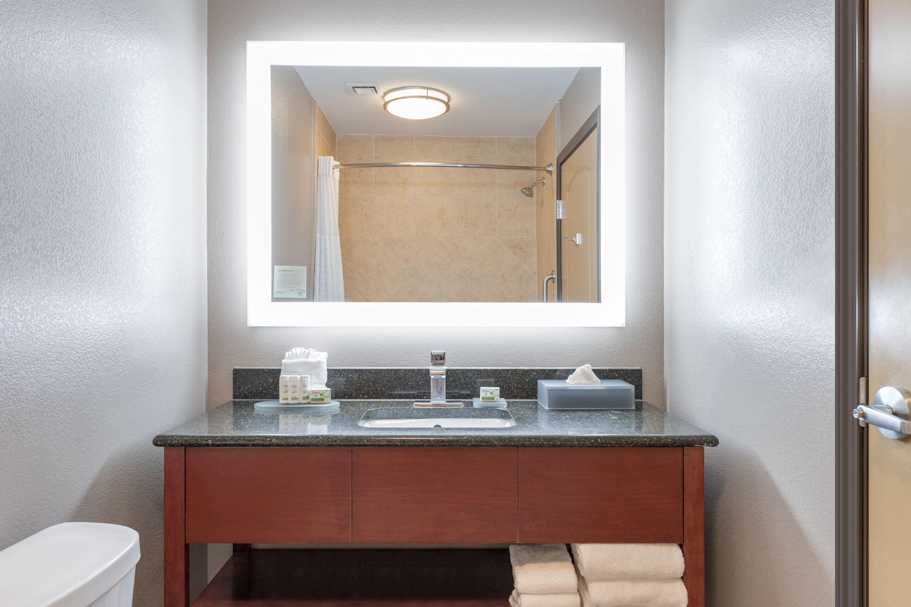 Guest room bath at the La Quinta Inn & Suites by Wyndham Woodway - Waco South in Woodway, Texas