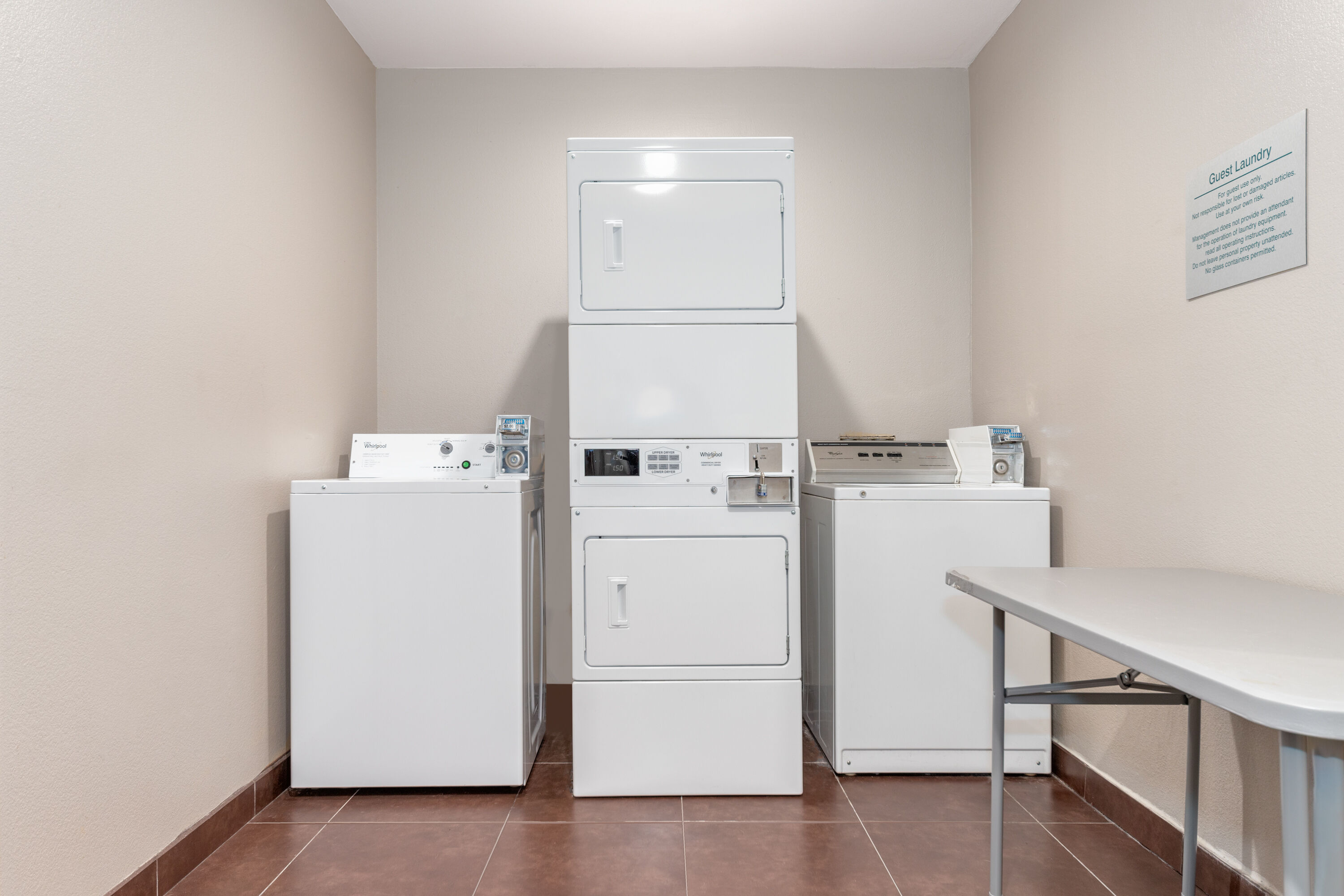 Laundry facilities at La Quinta Inn & Suites by Wyndham Woodway - Waco South in Woodway, Texas