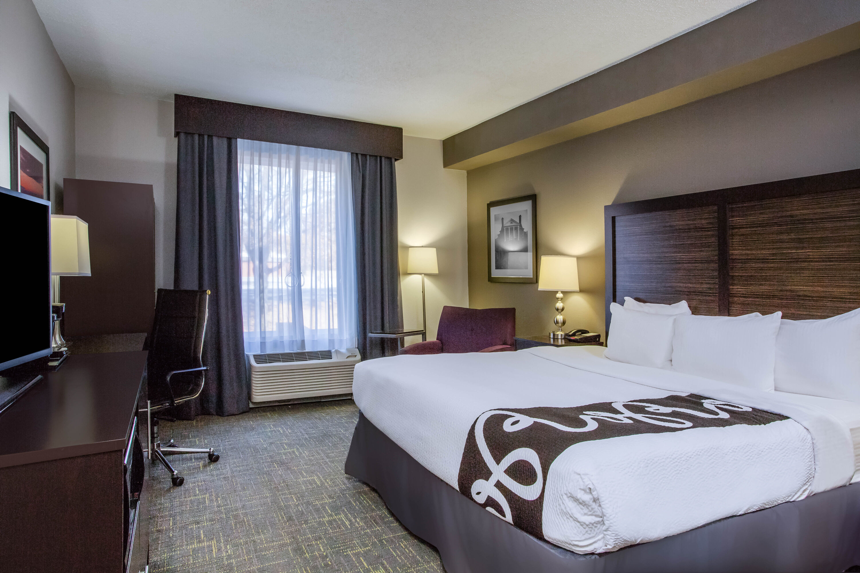 Guest room at the La Quinta Inn & Suites by Wyndham Lynchburg at Liberty Univ. in Lynchburg, Virginia