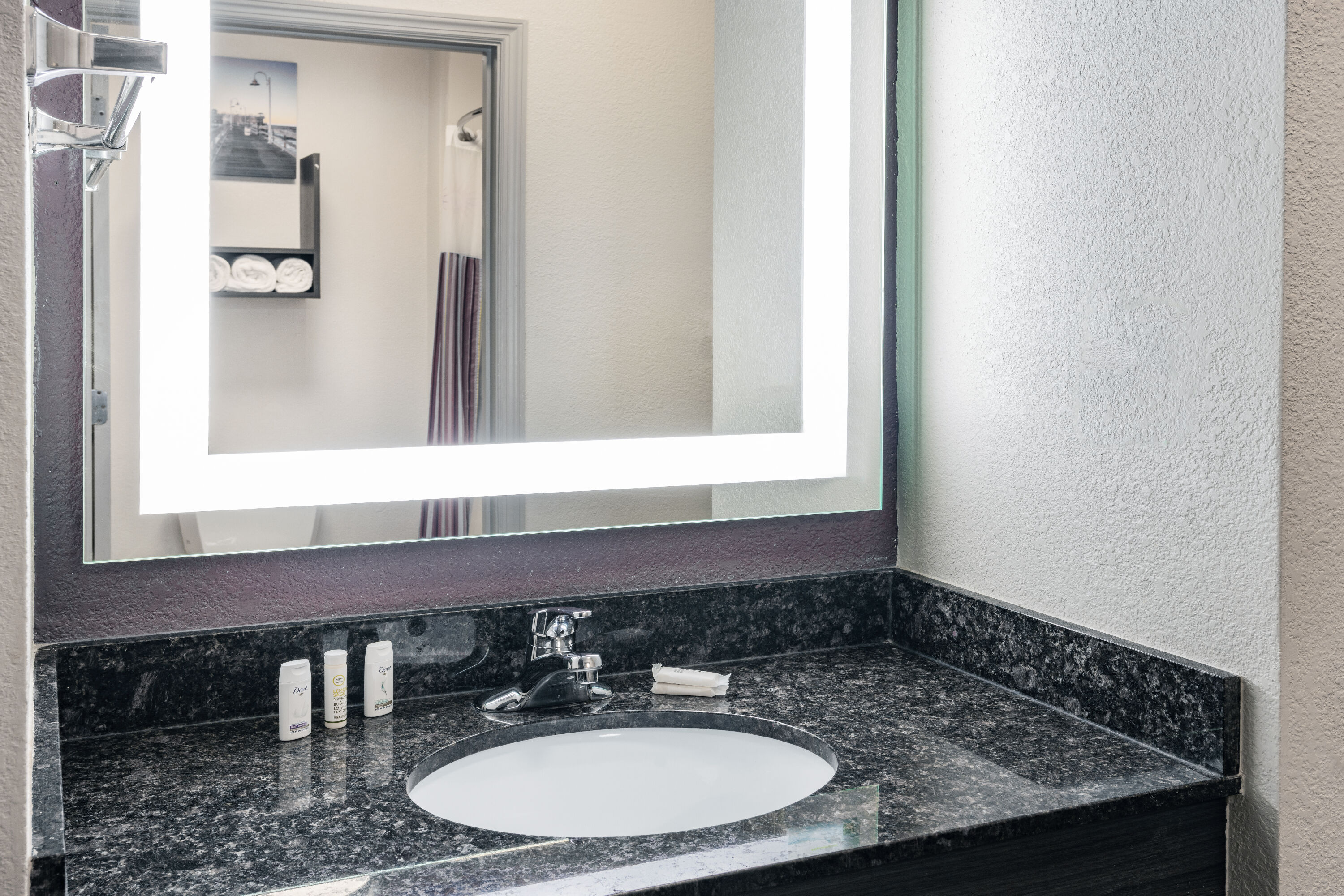 Guest room bath at the La Quinta Inn & Suites by Wyndham Norfolk in Norfolk, Virginia