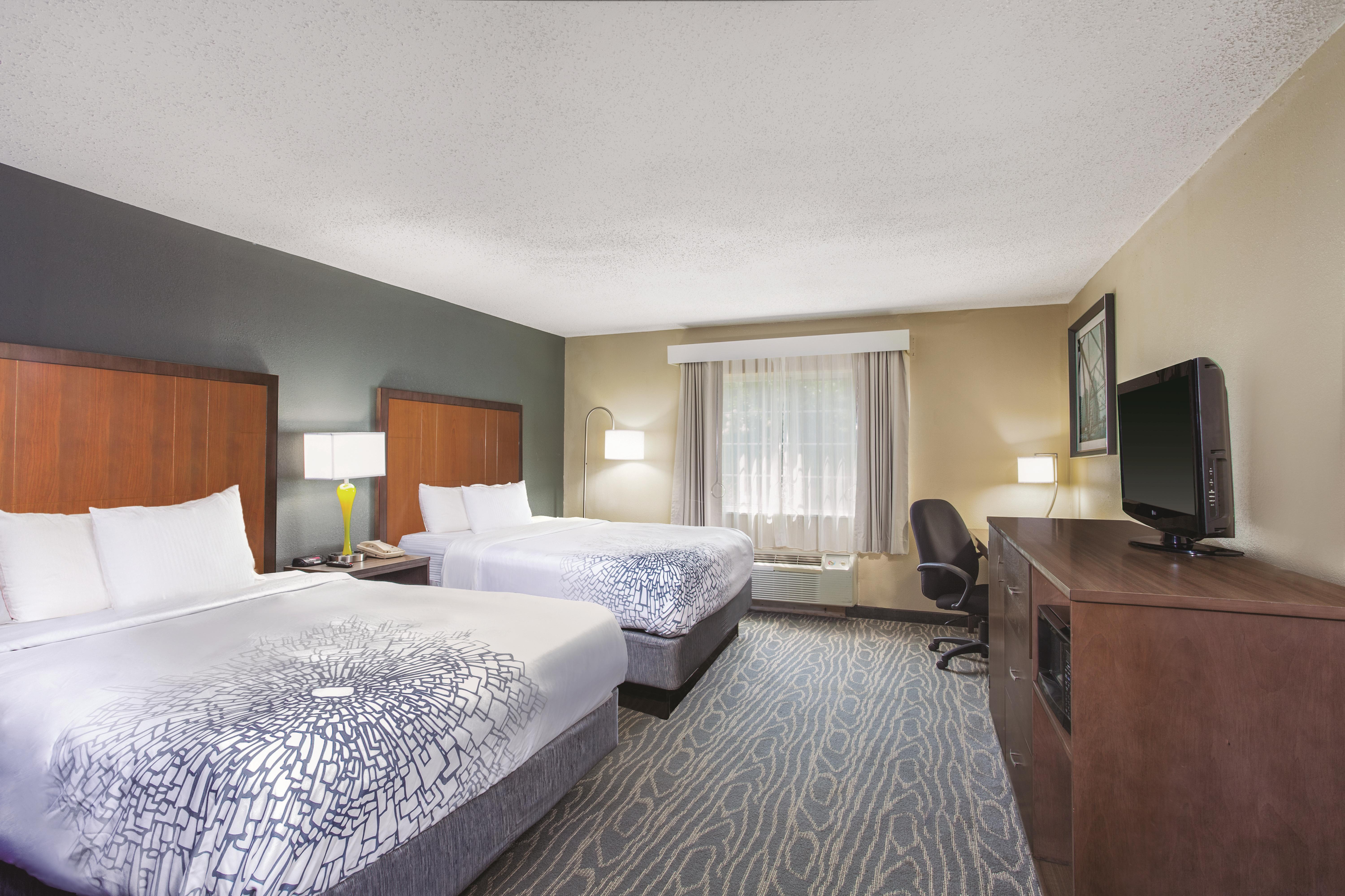 Guest room at the La Quinta Inn by Wyndham Richmond South in Richmond, Virginia