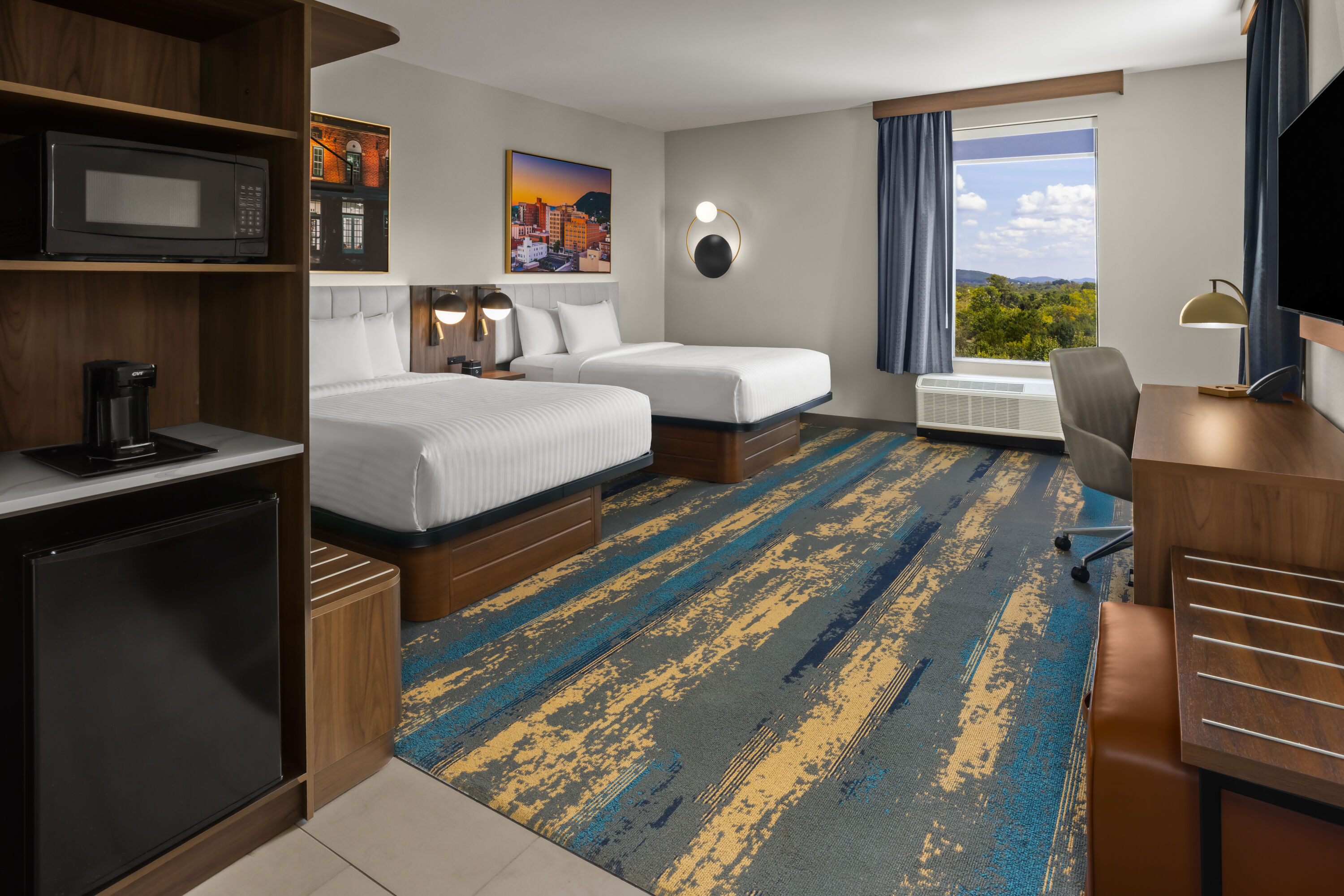 Guest room at the La Quinta Inn & Suites by Wyndham Roanoke Hollins/I-81 in Roanoke, Virginia