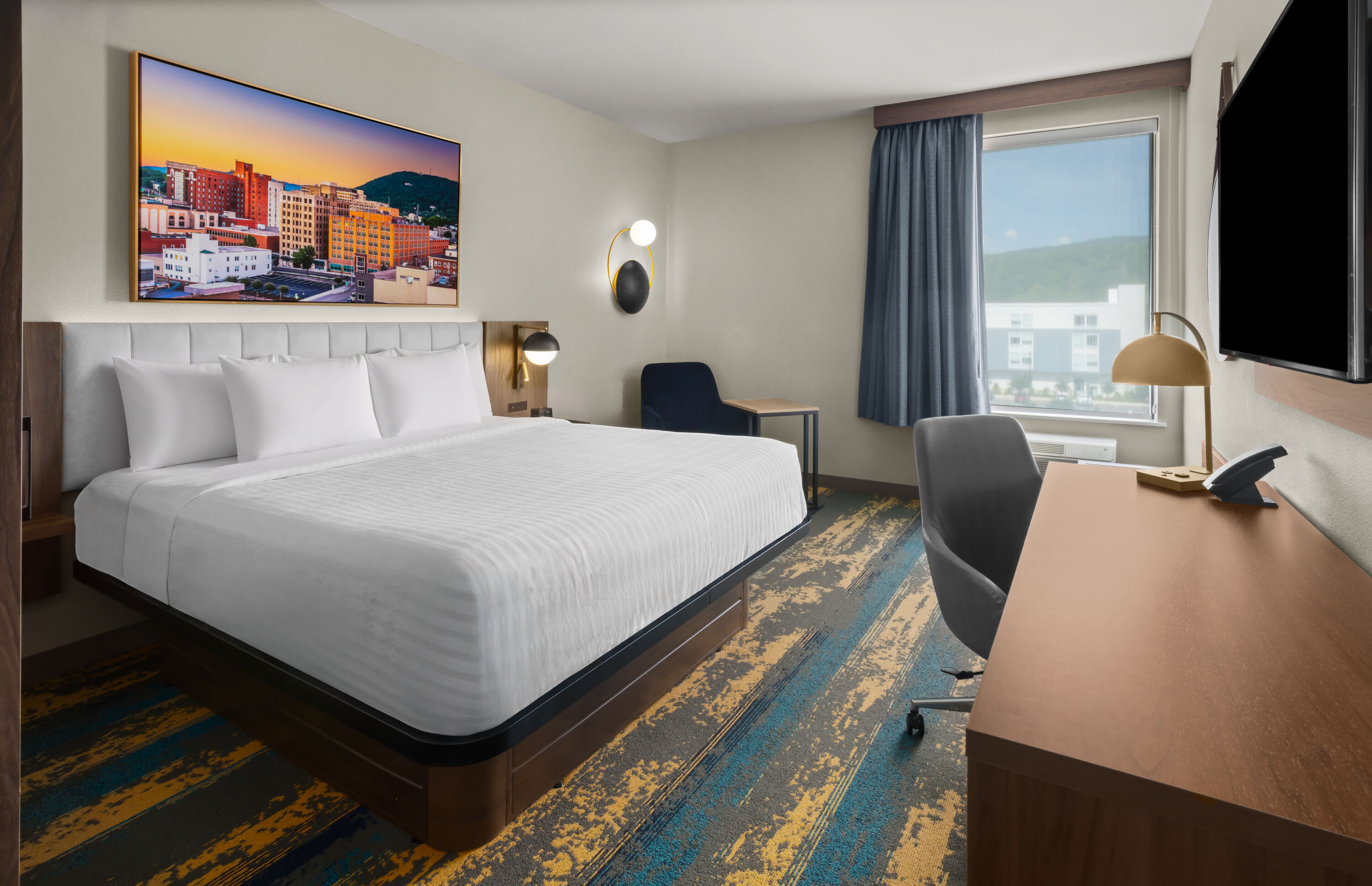 Guest room at the La Quinta Inn & Suites by Wyndham Roanoke Hollins/I-81 in Roanoke, Virginia
