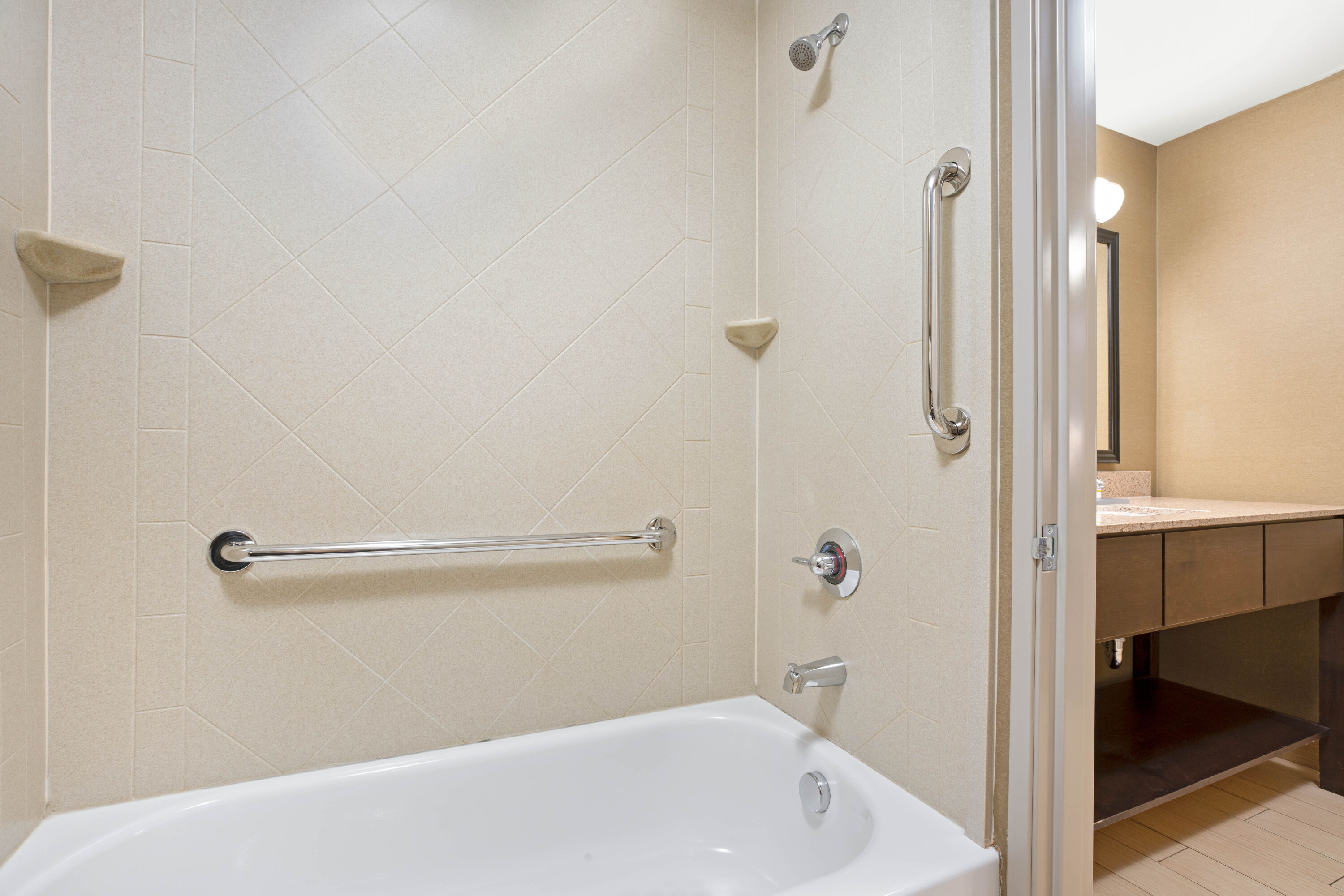 Guest room bath at the La Quinta Inn & Suites by Wyndham Bellingham in Bellingham, Washington