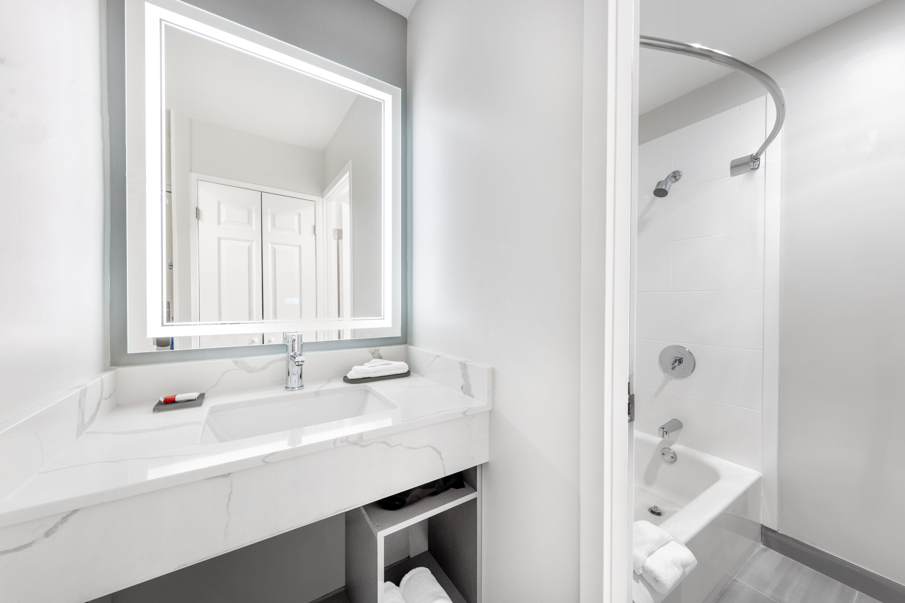 Guest room bath at the La Quinta Inn by Wyndham Lynnwood in Lynnwood, Washington