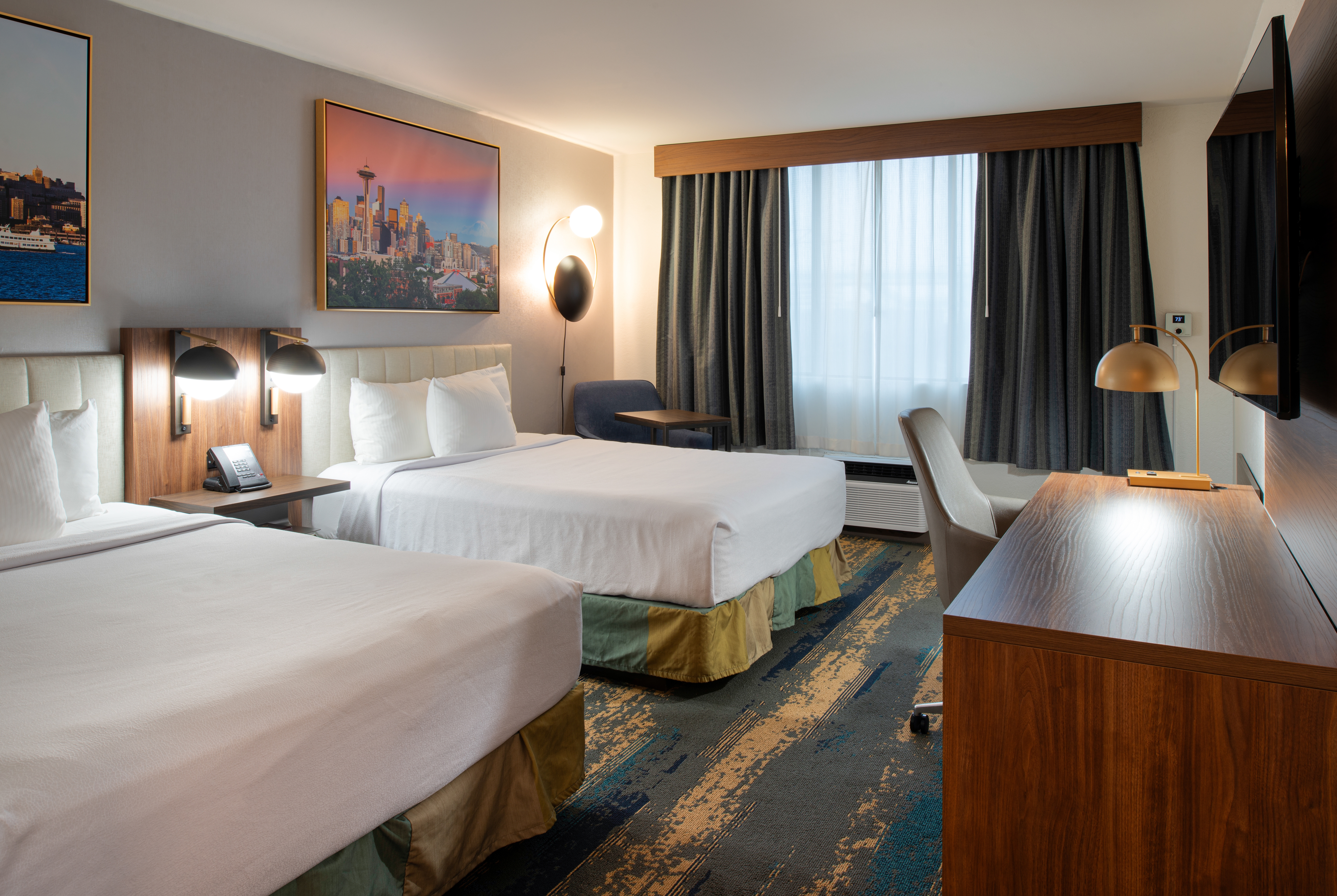 Double bed guest room at the La Quinta Inn & Suites by Wyndham Seattle Sea-Tac Airport in Seattle, Washington