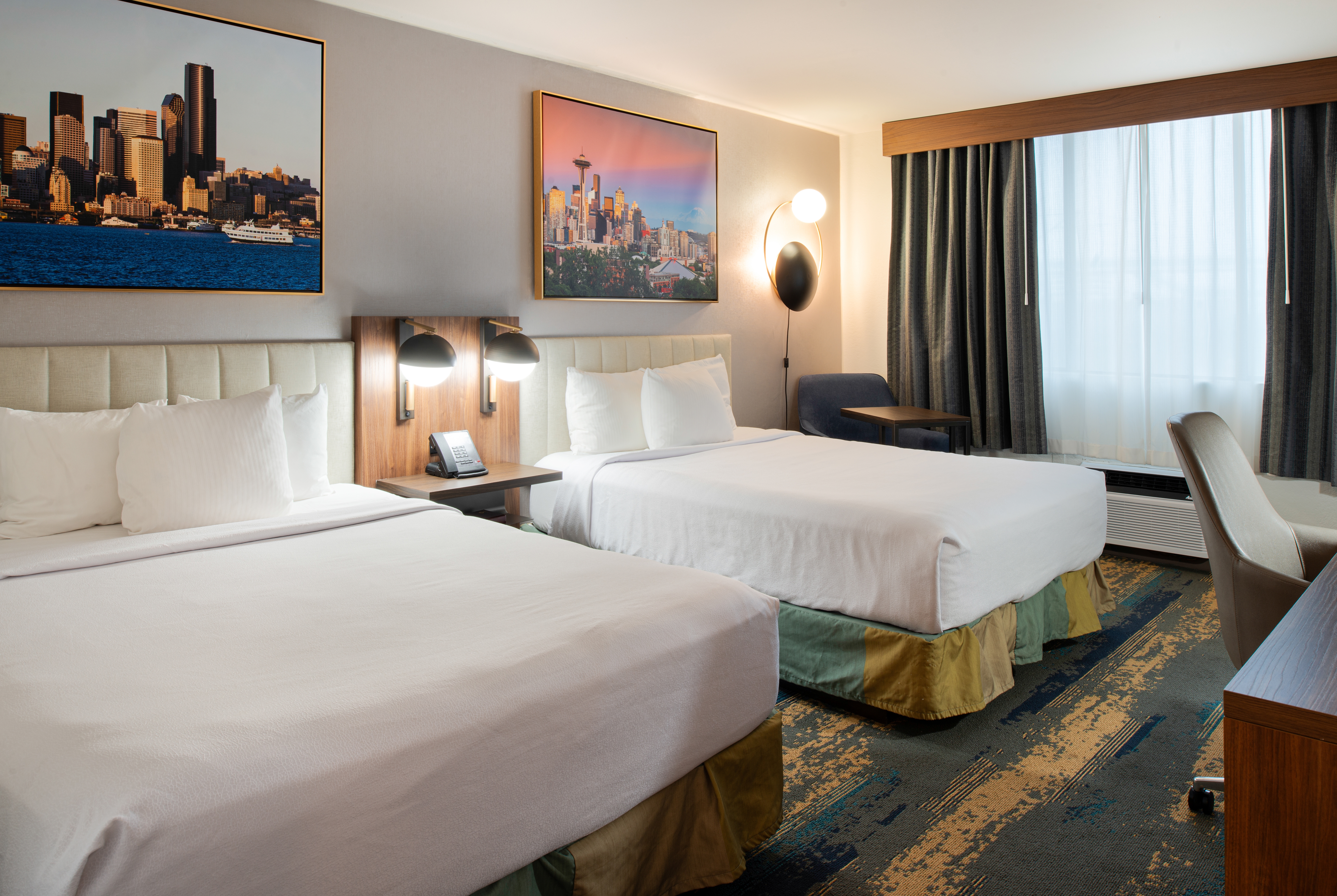 Double bed guest room at the La Quinta Inn & Suites by Wyndham Seattle Sea-Tac Airport in Seattle, Washington