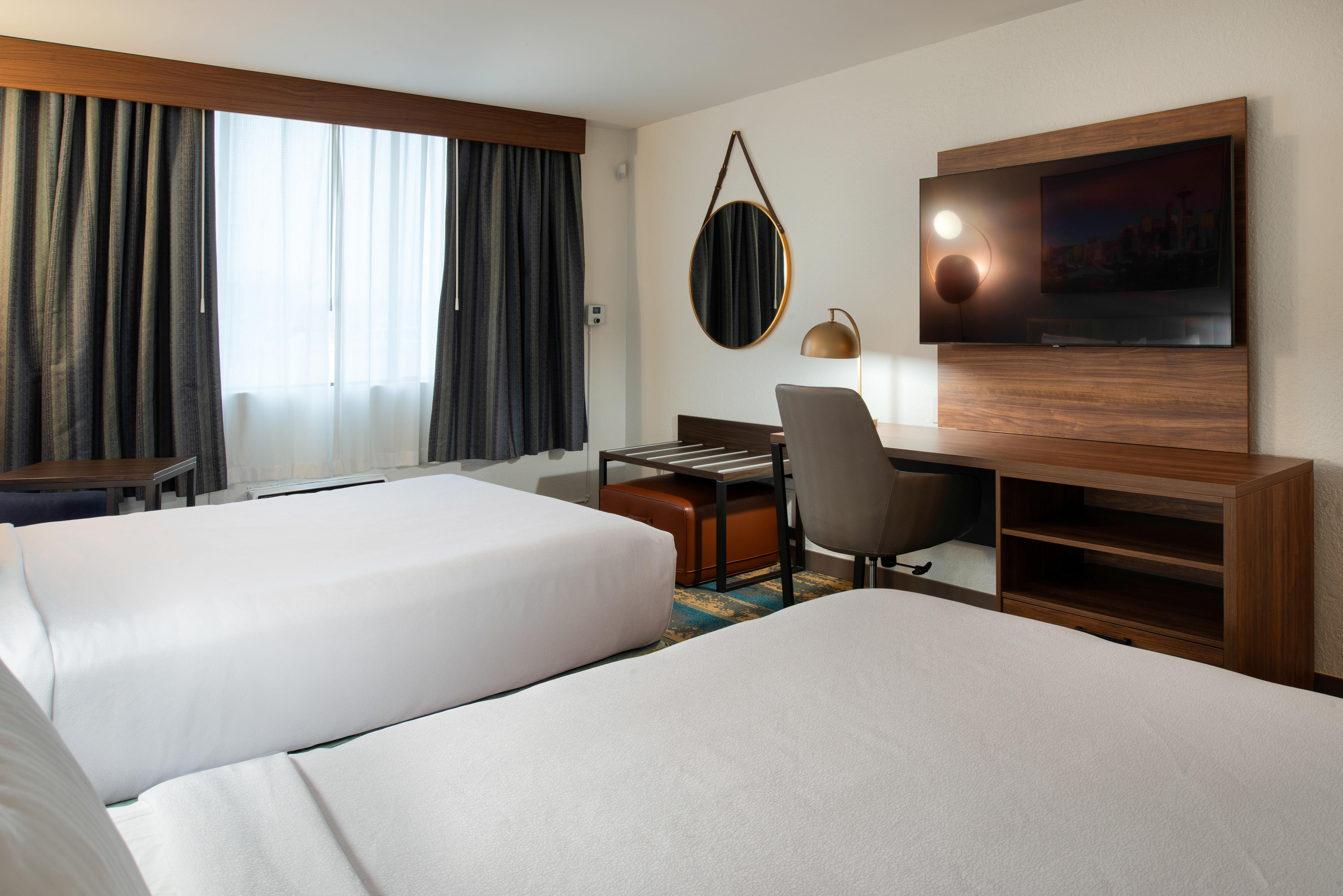 Double bed guest room at the La Quinta Inn & Suites by Wyndham Seattle Sea-Tac Airport in Seattle, Washington