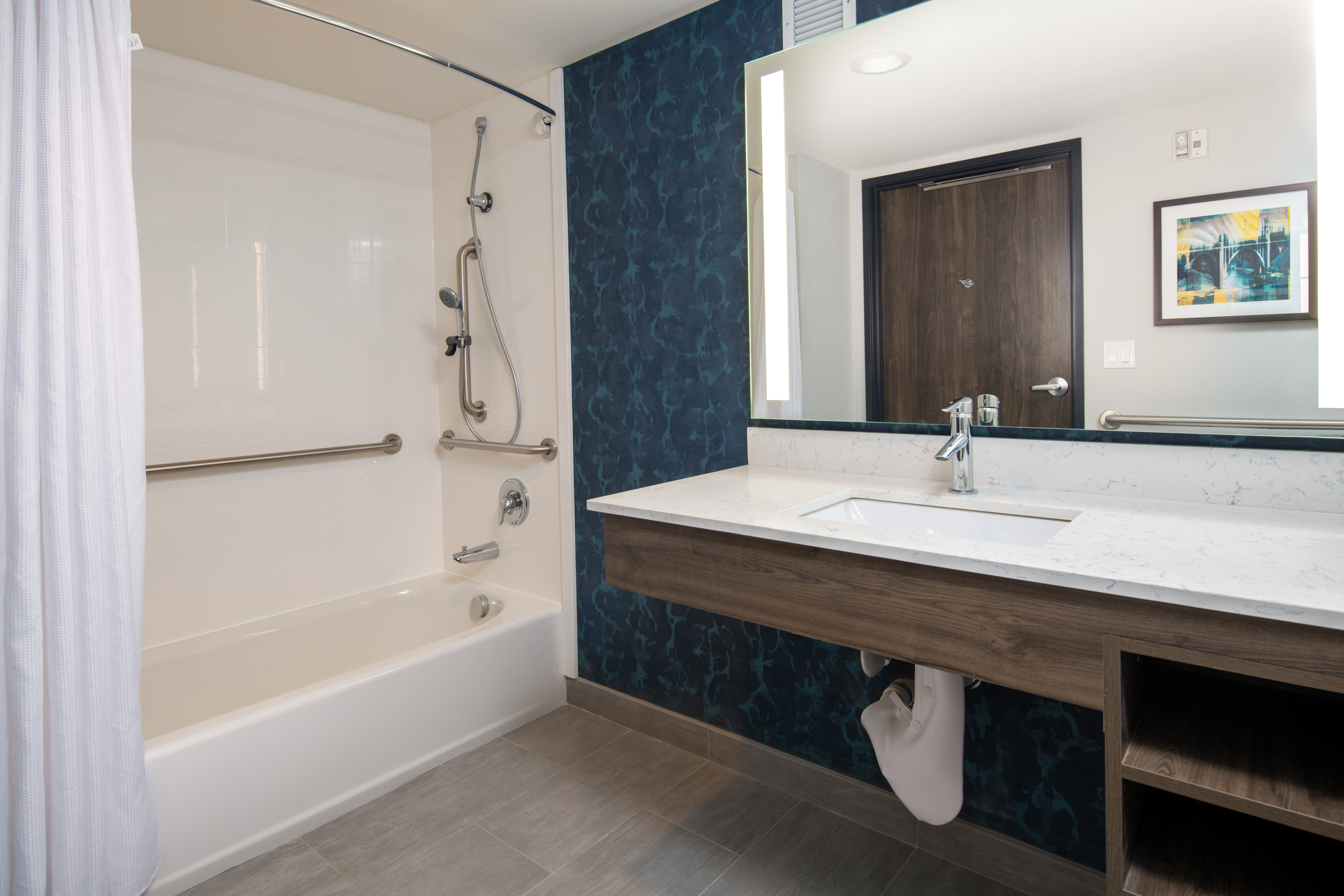 Guest room bath at the La Quinta Inn & Suites by Wyndham Spokane Downtown in Spokane, Washington