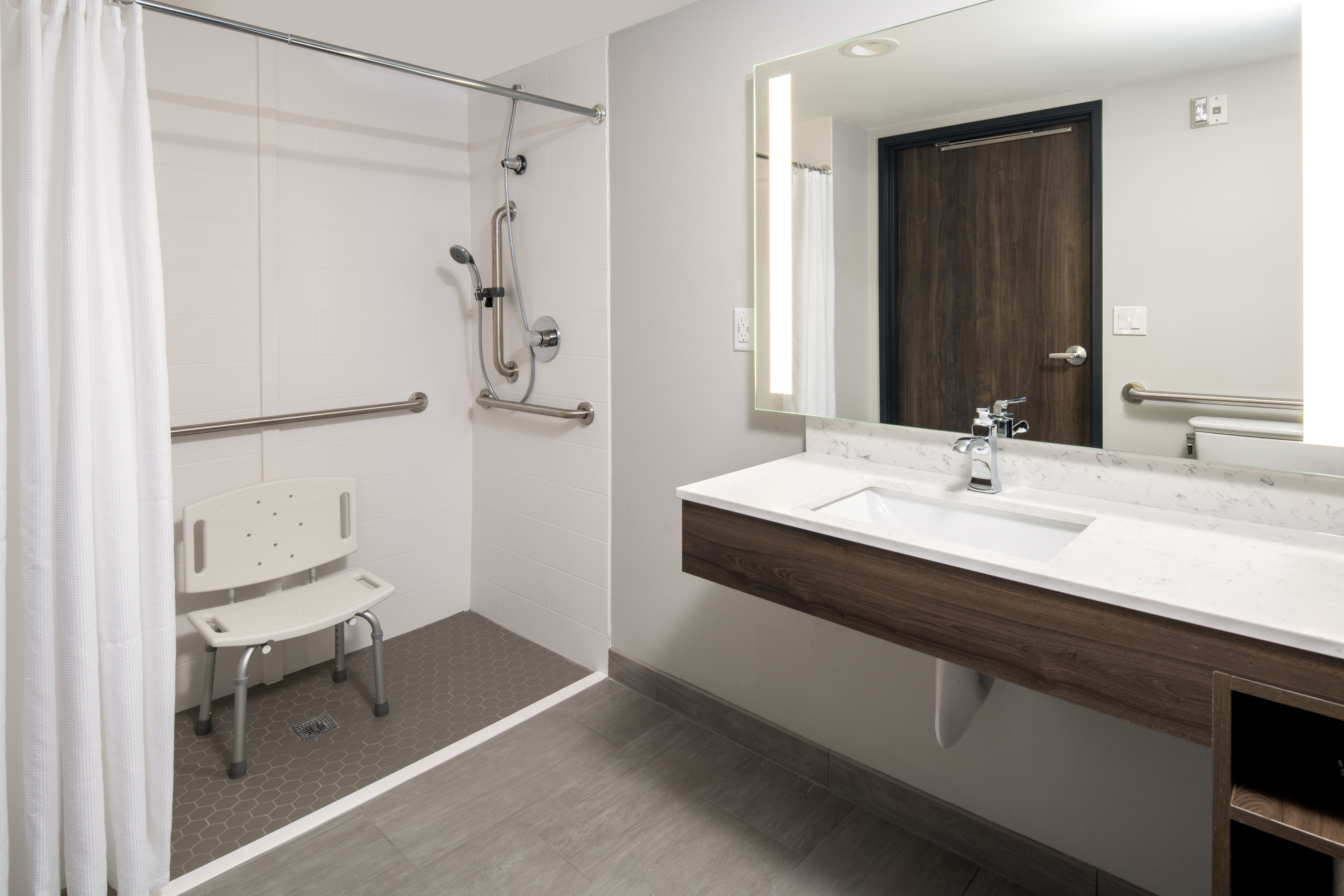 Guest room bath at the La Quinta Inn & Suites by Wyndham Spokane Downtown in Spokane, Washington