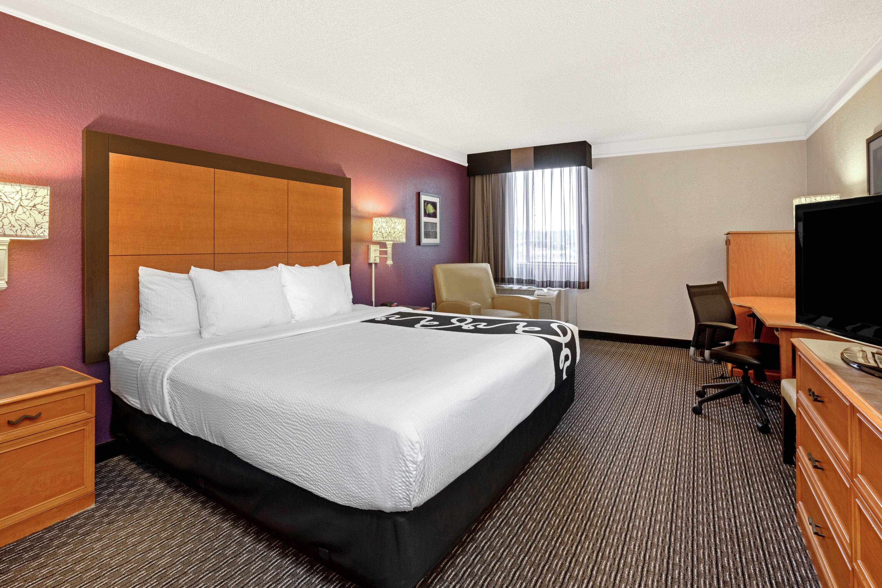 Guest room at the La Quinta Inn & Suites by Wyndham Tacoma - Seattle in Tacoma, Washington