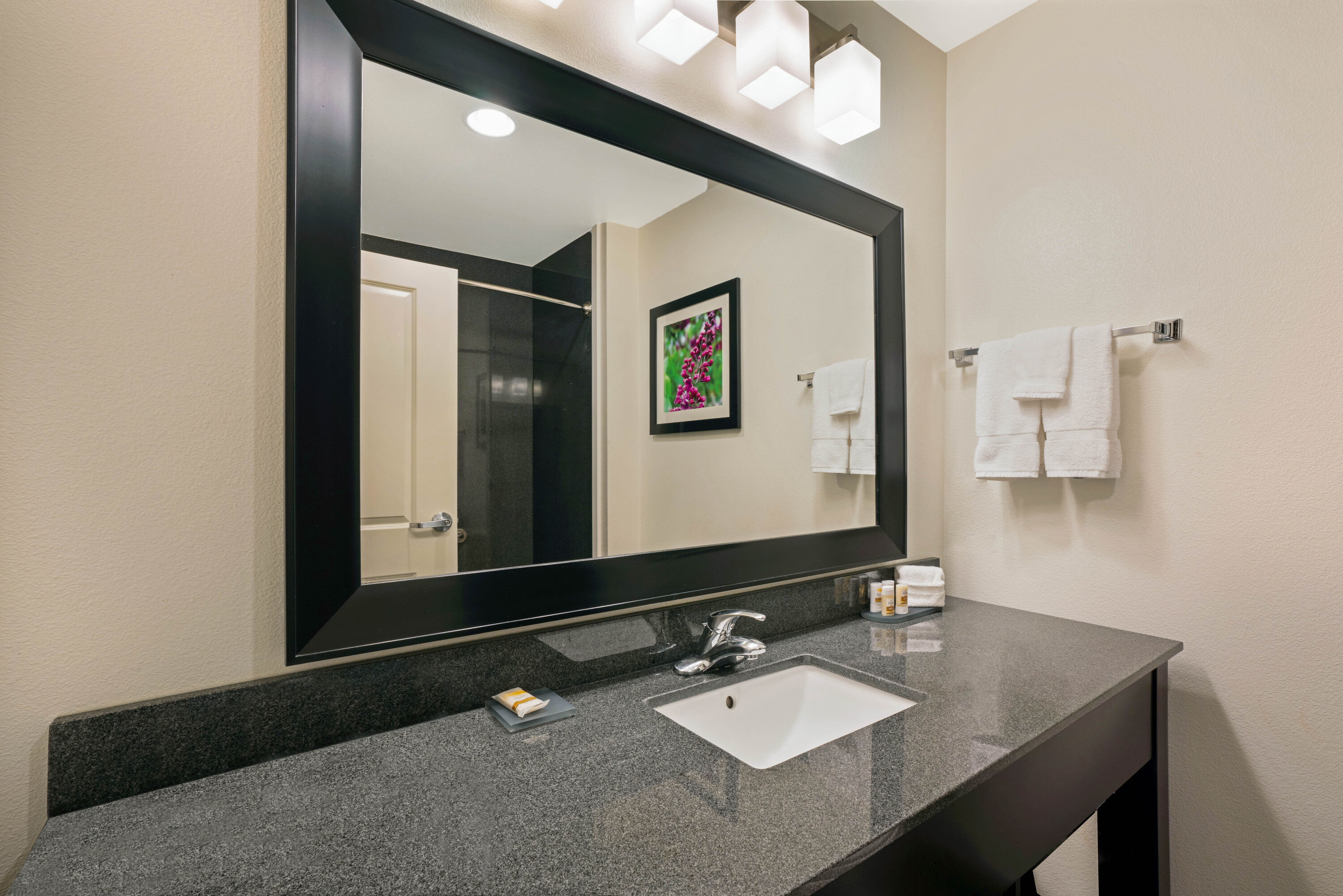 Guest room bath at the La Quinta Inn & Suites by Wyndham Tumwater - Olympia in Tumwater, Washington