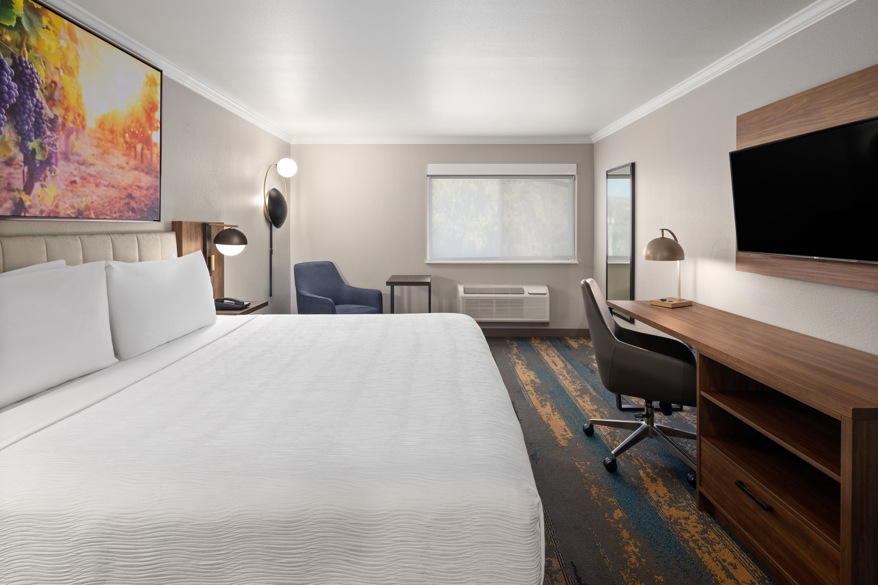 Guest room at the La Quinta Inn & Suites by Wyndham Yakima Downtown in Yakima, Washington