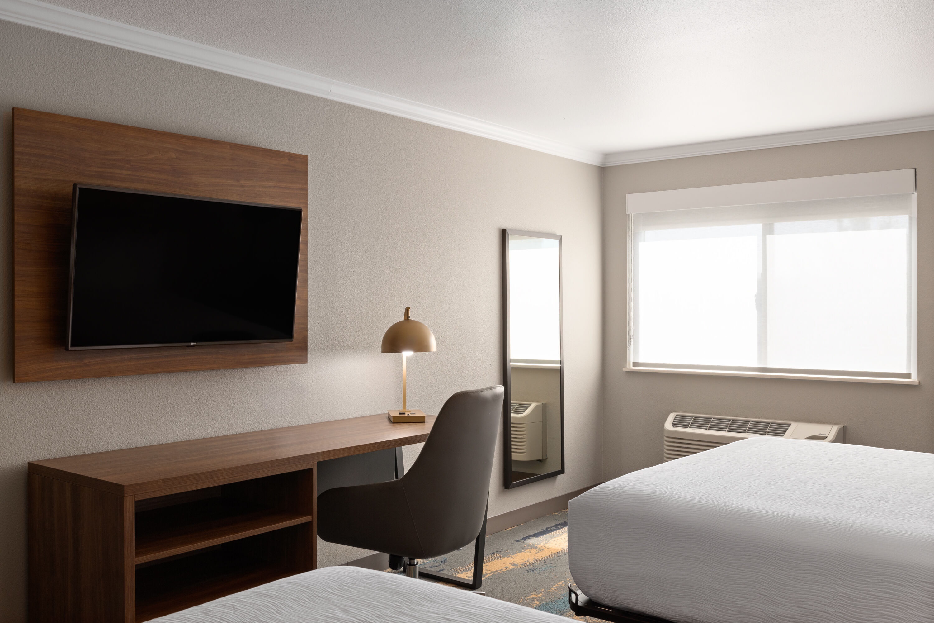 Guest room at the La Quinta Inn & Suites by Wyndham Yakima Downtown in Yakima, Washington