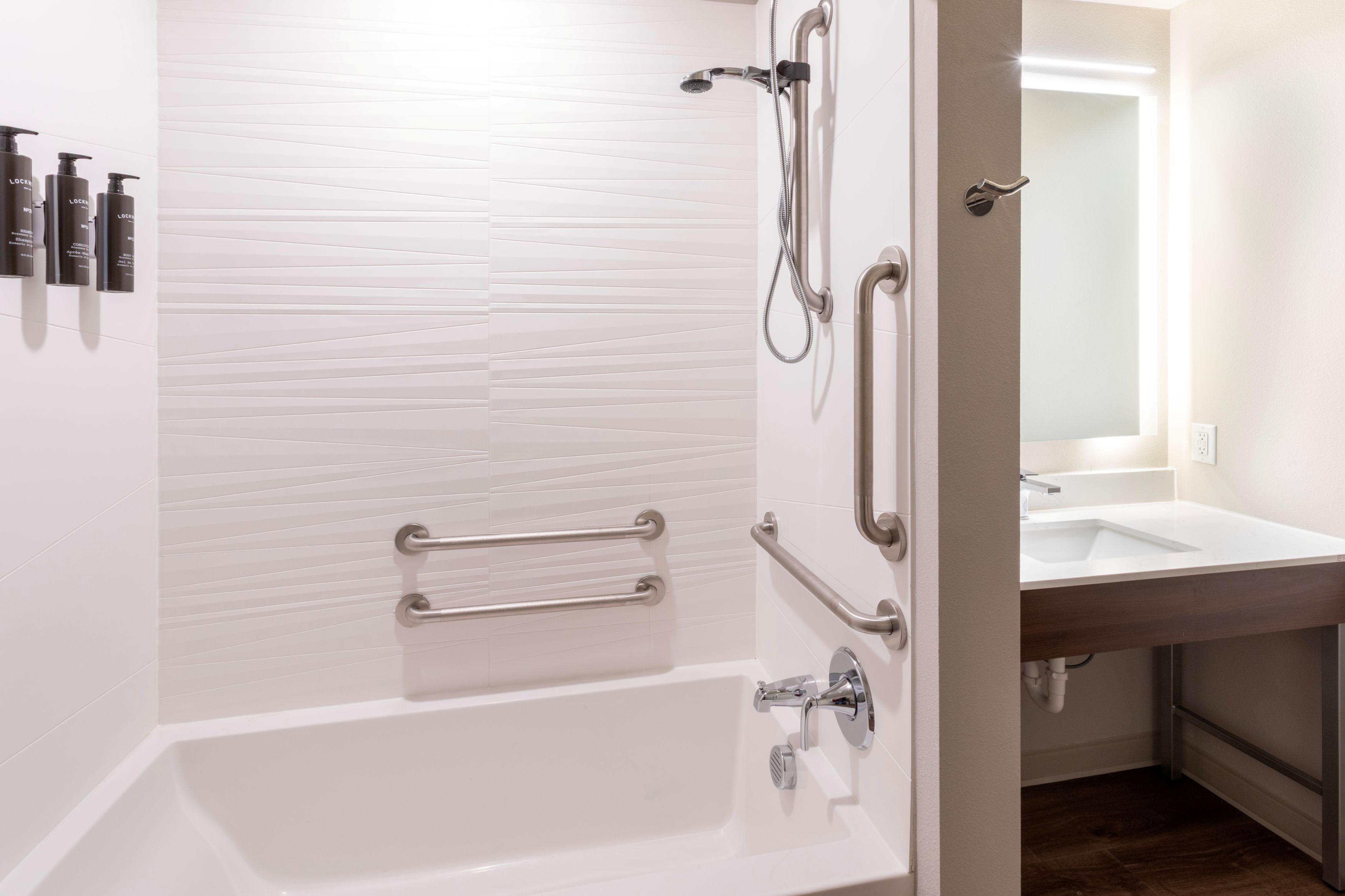 Guest room bath at the La Quinta Inn & Suites by Wyndham Kaukauna in Kaukauna, Wisconsin